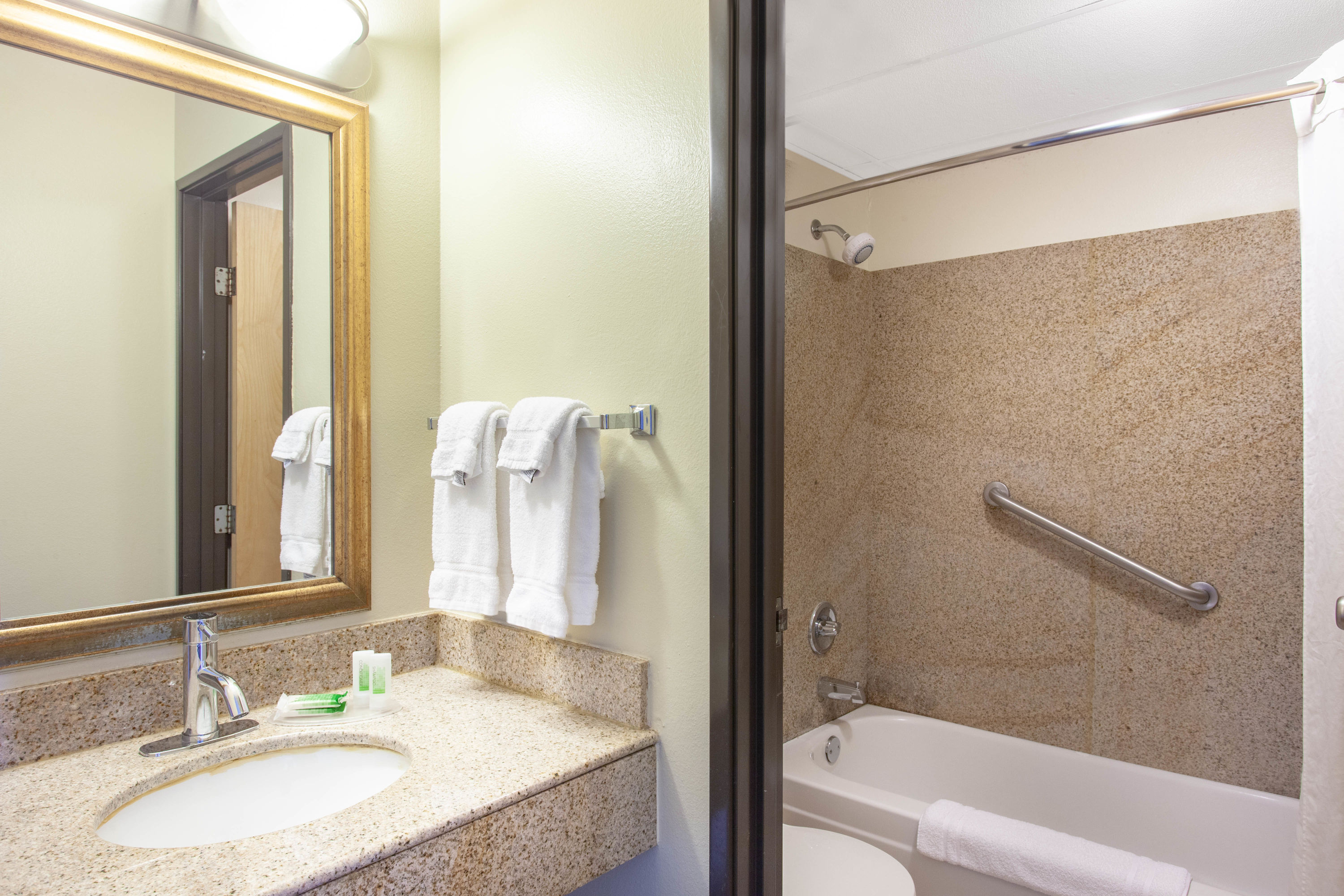 Guest room bath at the AmericInn by Wyndham Willmar in Willmar, Minnesota