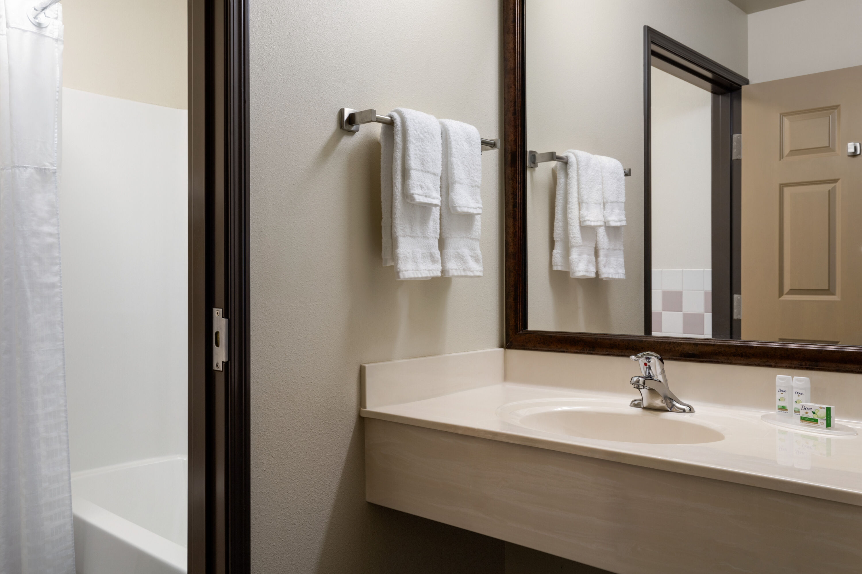 Guest room bath at the AmericInn by Wyndham Havre in Havre, Montana