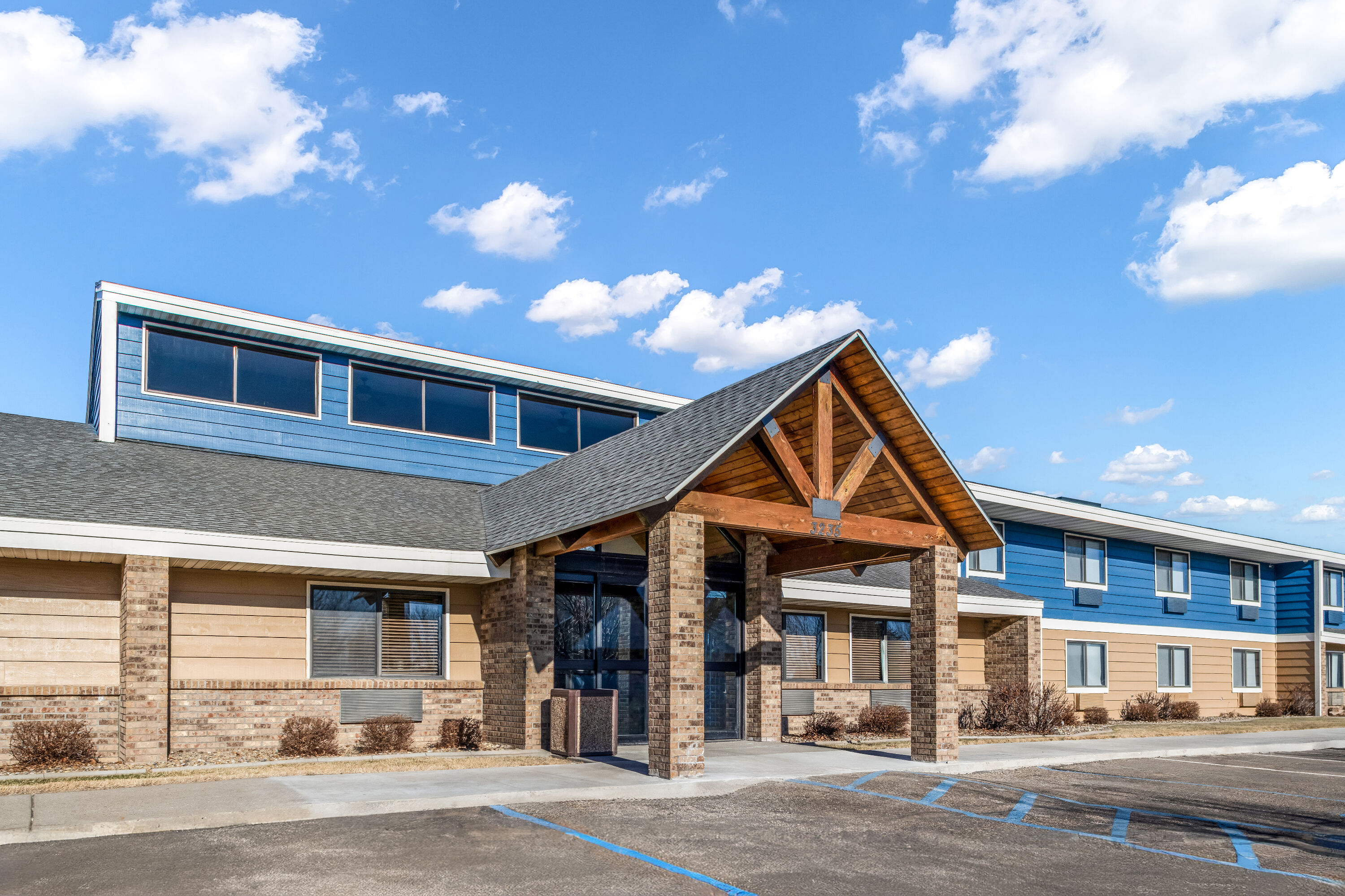 Exterior Day Image of AmericInn by Wyndham Bismarck hotel in Bismarck, North Dakota