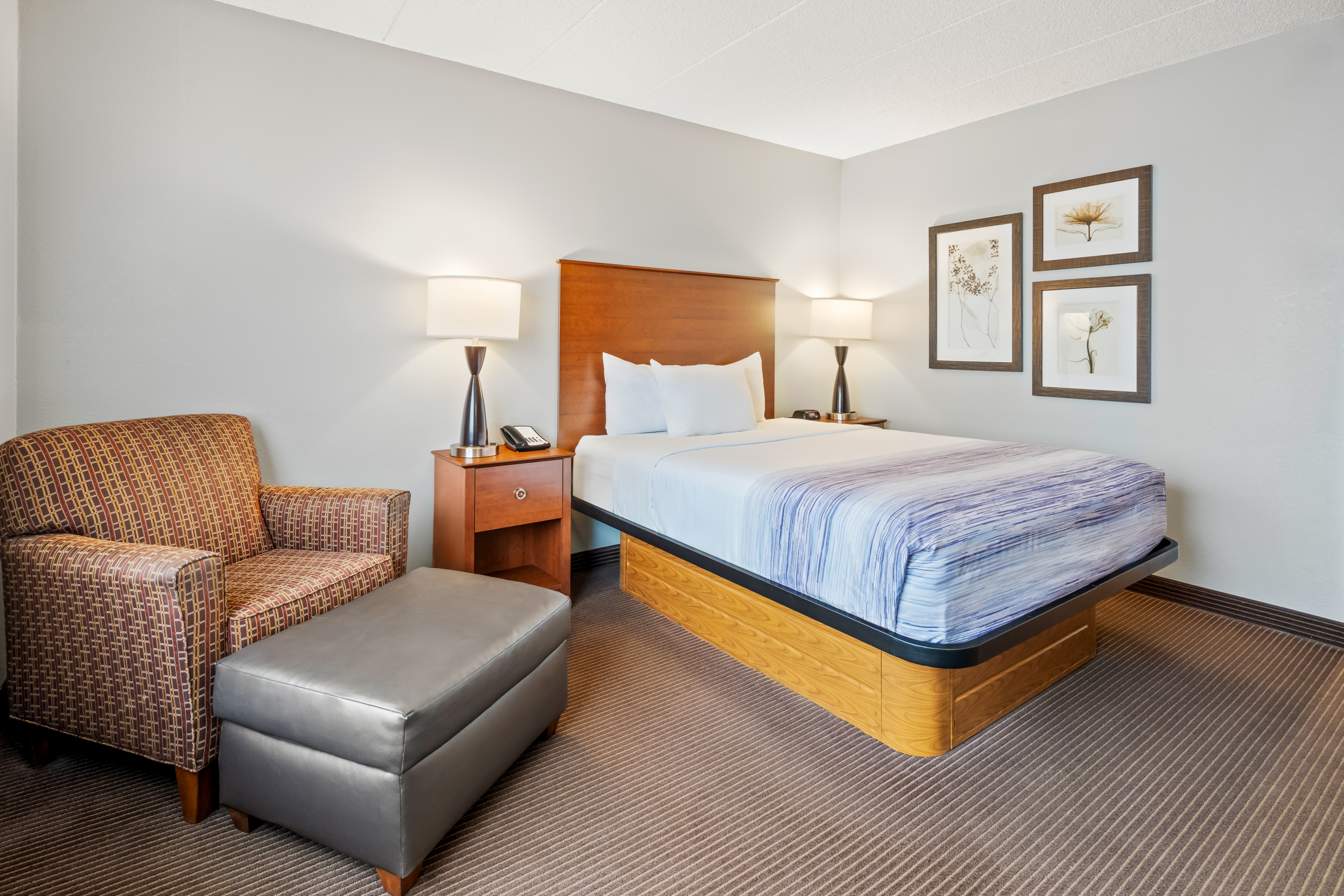 Guest room at the AmericInn by Wyndham Bismarck in Bismarck, North Dakota
