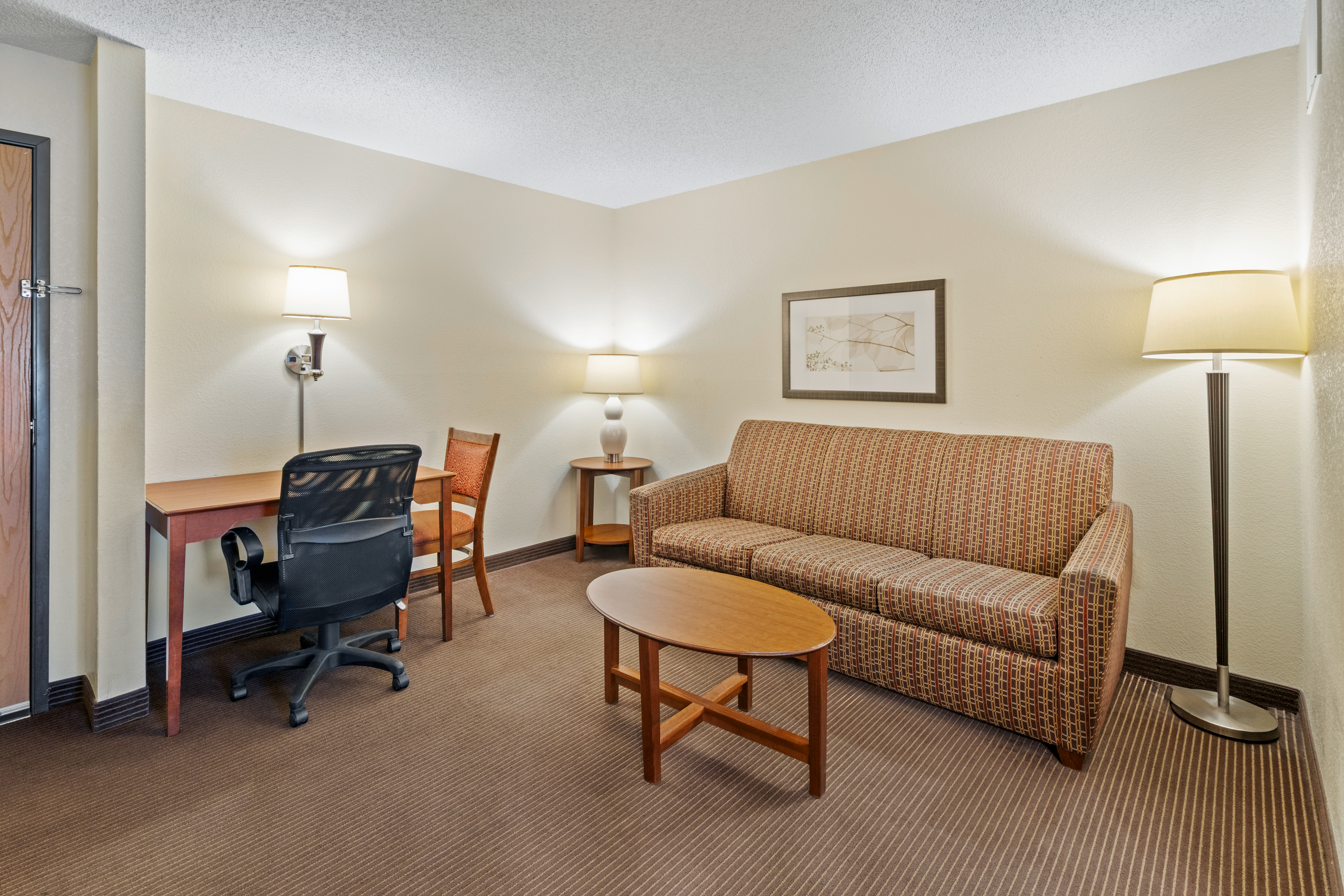 Guest room at the AmericInn by Wyndham Bismarck in Bismarck, North Dakota