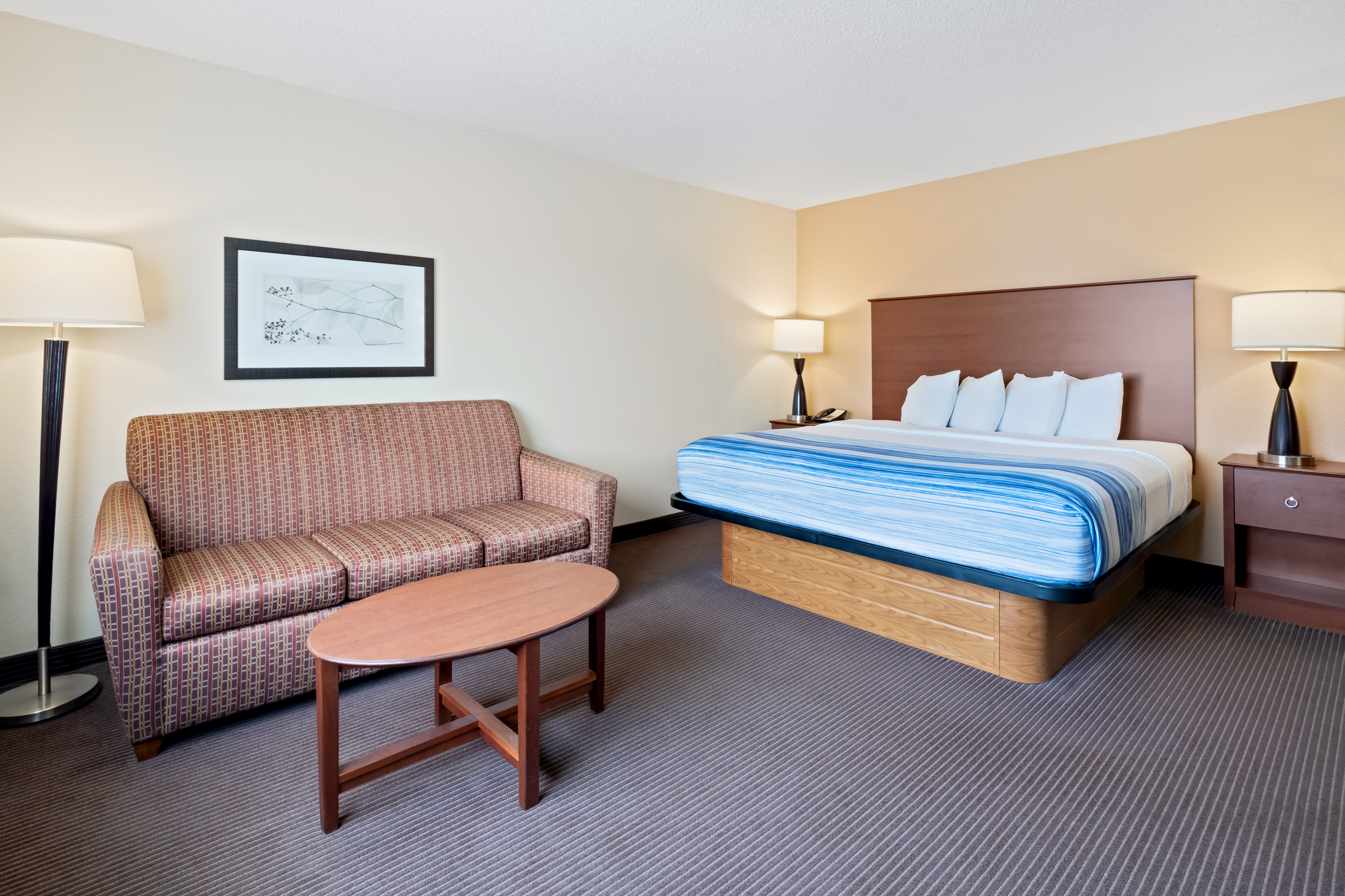 Guest room at the AmericInn by Wyndham Bismarck in Bismarck, North Dakota