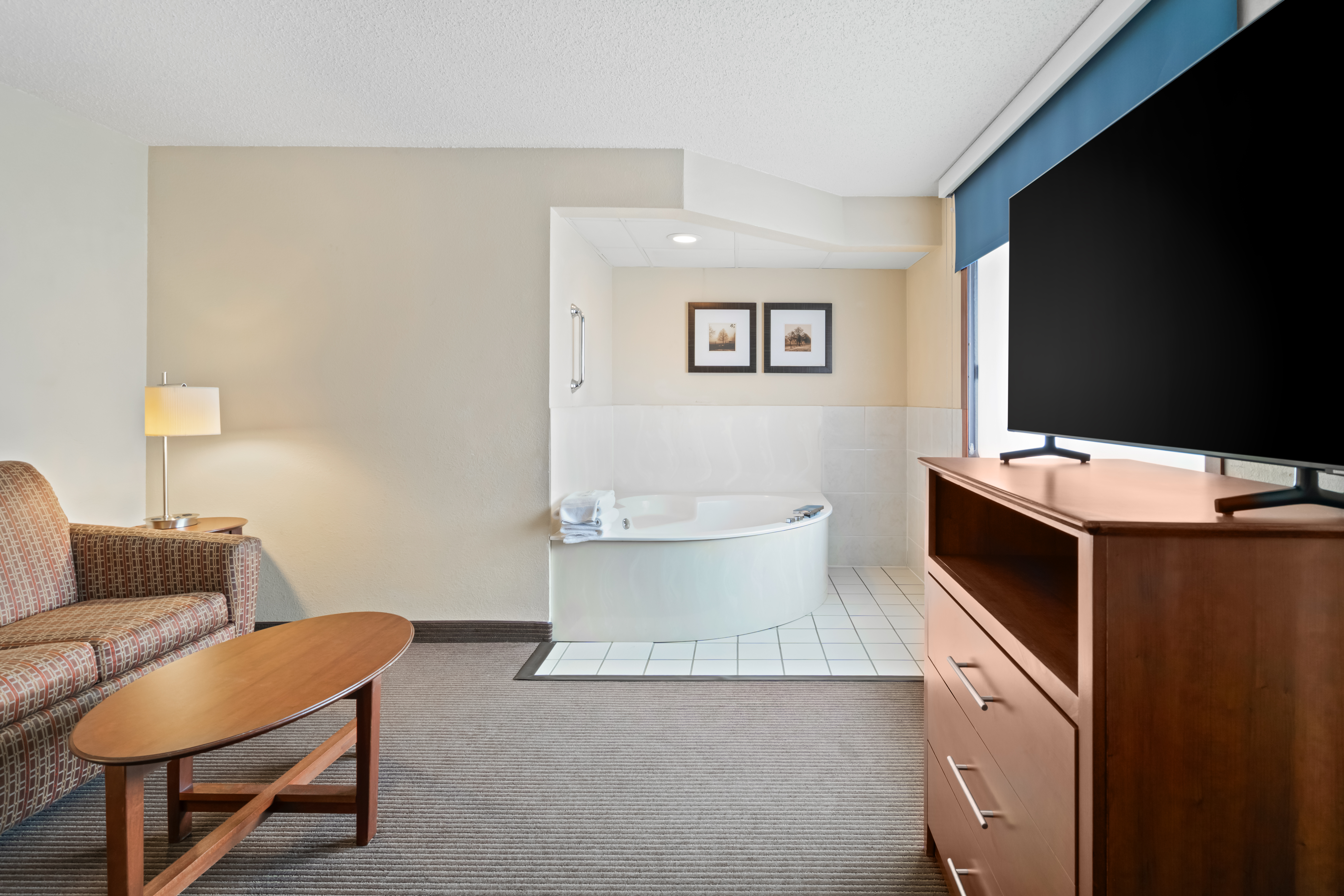 Guest room at the AmericInn by Wyndham Bismarck in Bismarck, North Dakota
