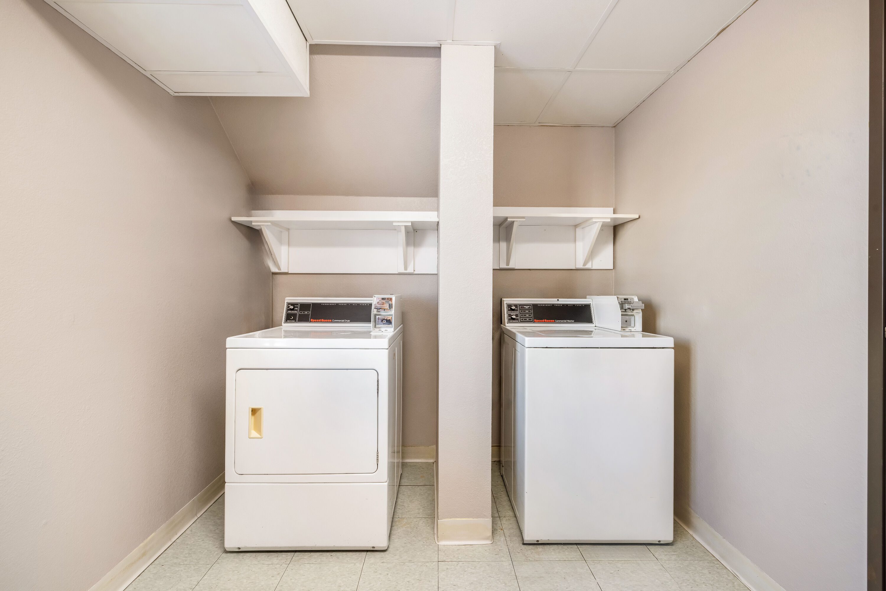 Laundry facilities at AmericInn by Wyndham Bismarck in Bismarck, North Dakota