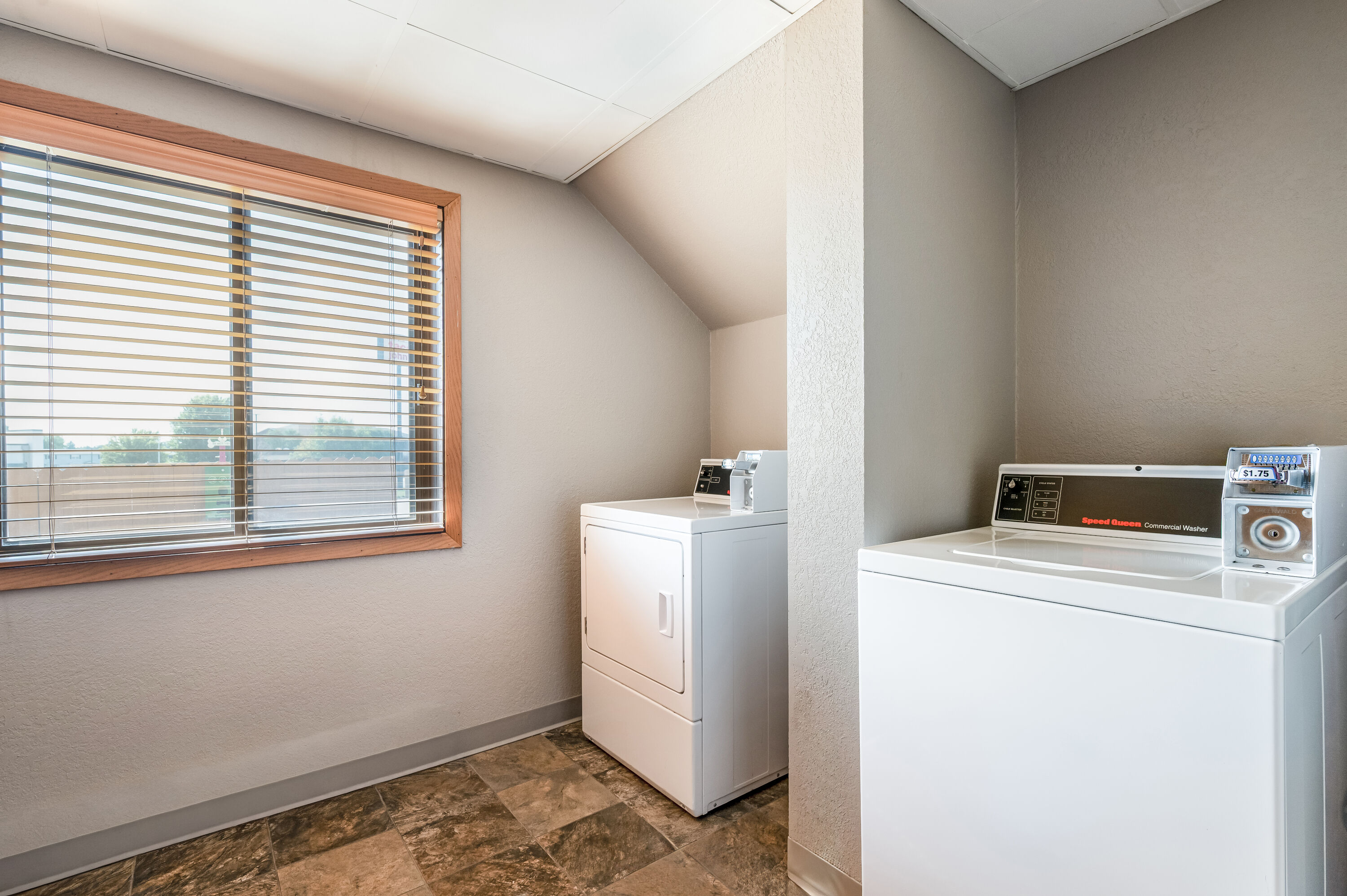 Laundry facilities at AmericInn by Wyndham Dickinson in Dickinson, North Dakota