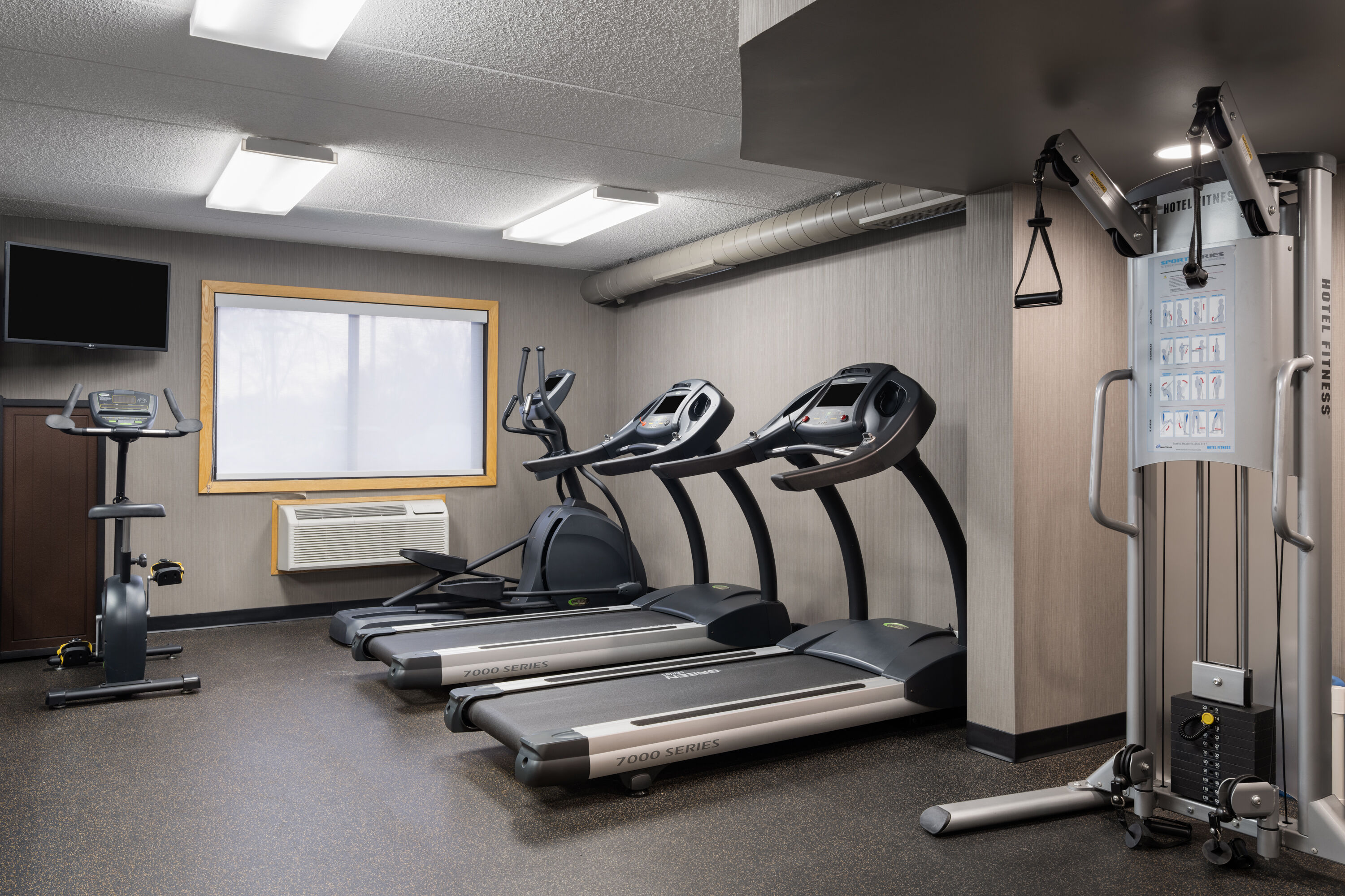 Fitness room at AmericInn by Wyndham Grand Forks in Grand Forks, North Dakota
