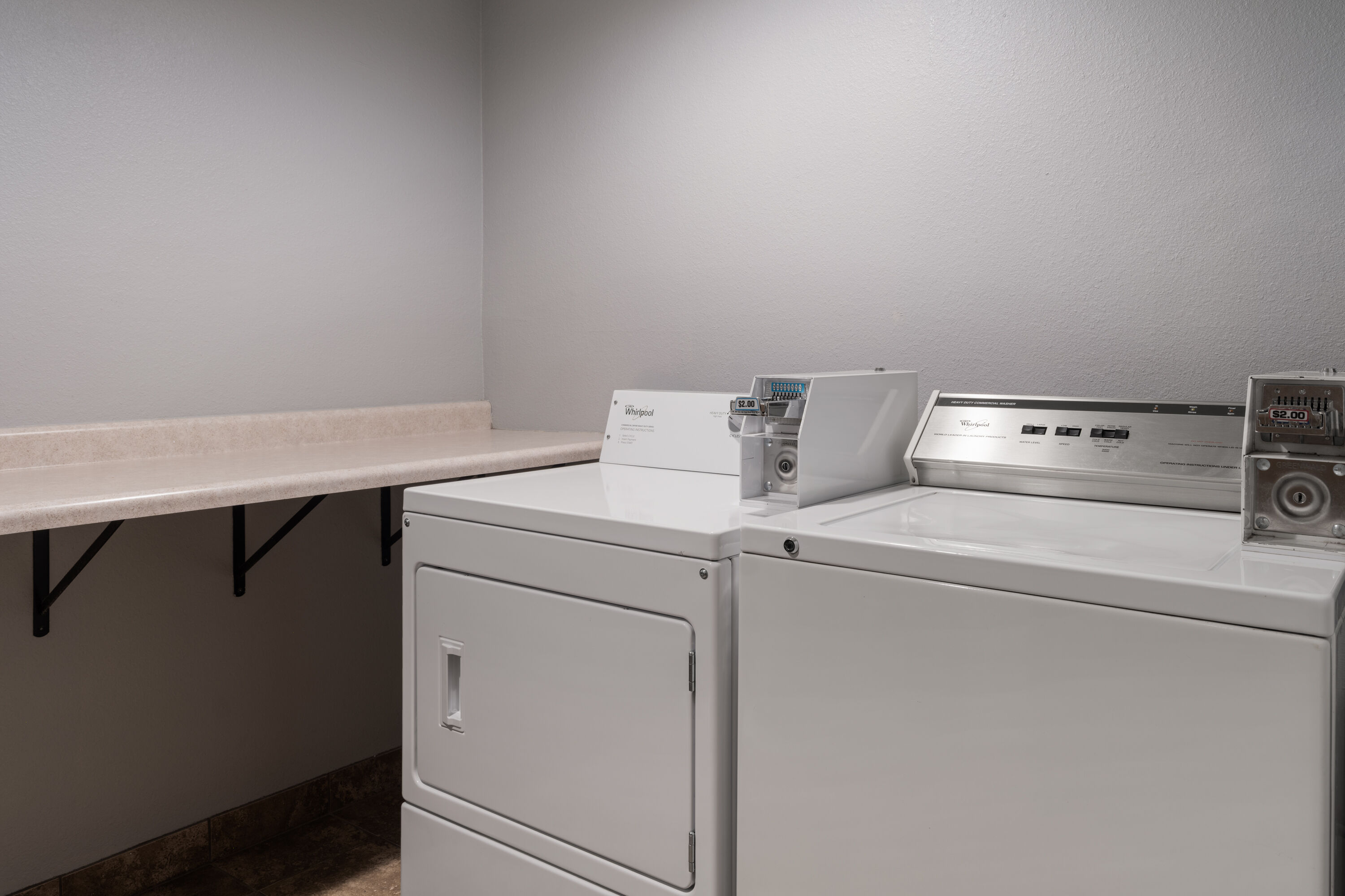 Laundry facilities at AmericInn by Wyndham Grand Forks in Grand Forks, North Dakota