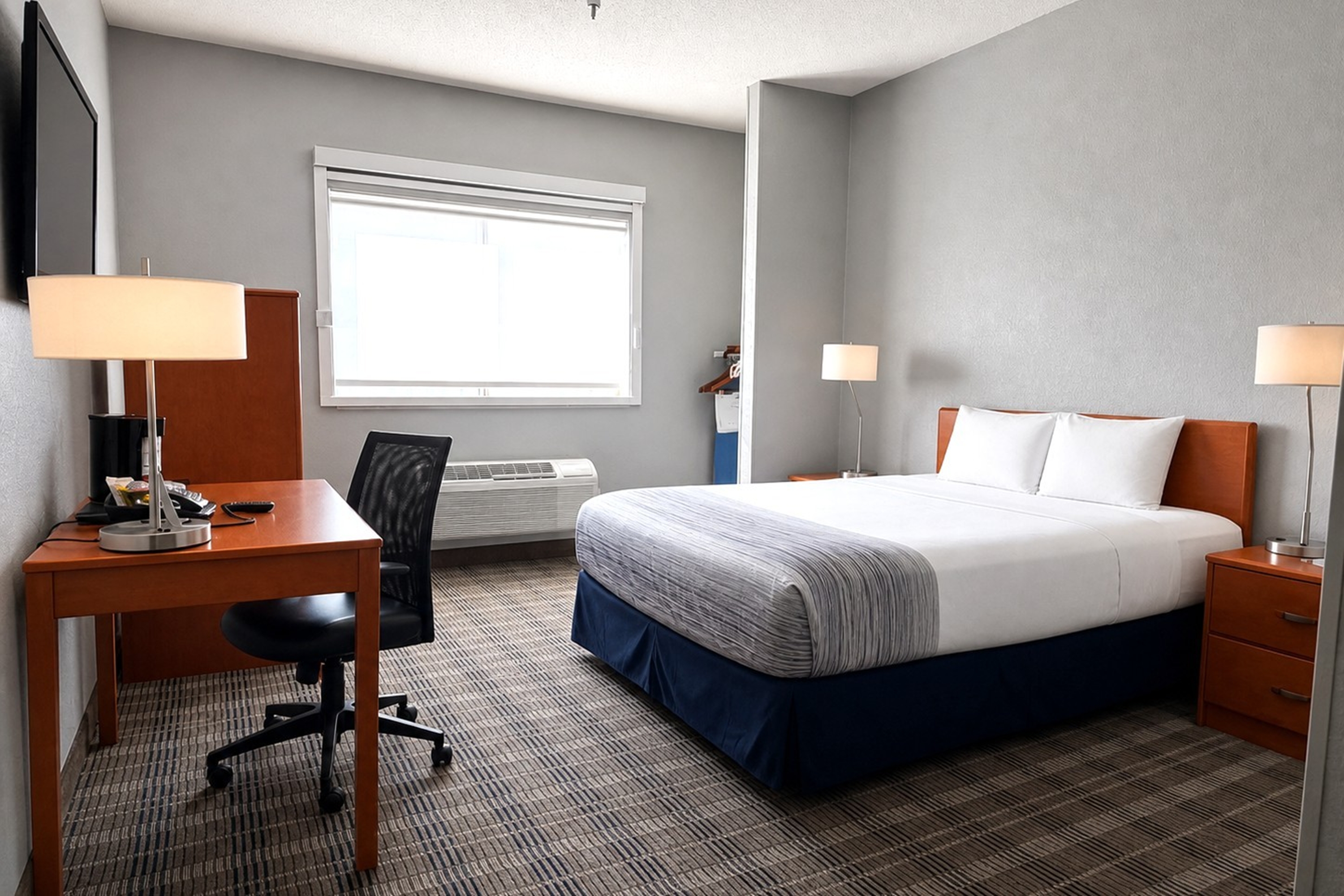 Guest room at the AmericInn by Wyndham Minot in Minot, North Dakota