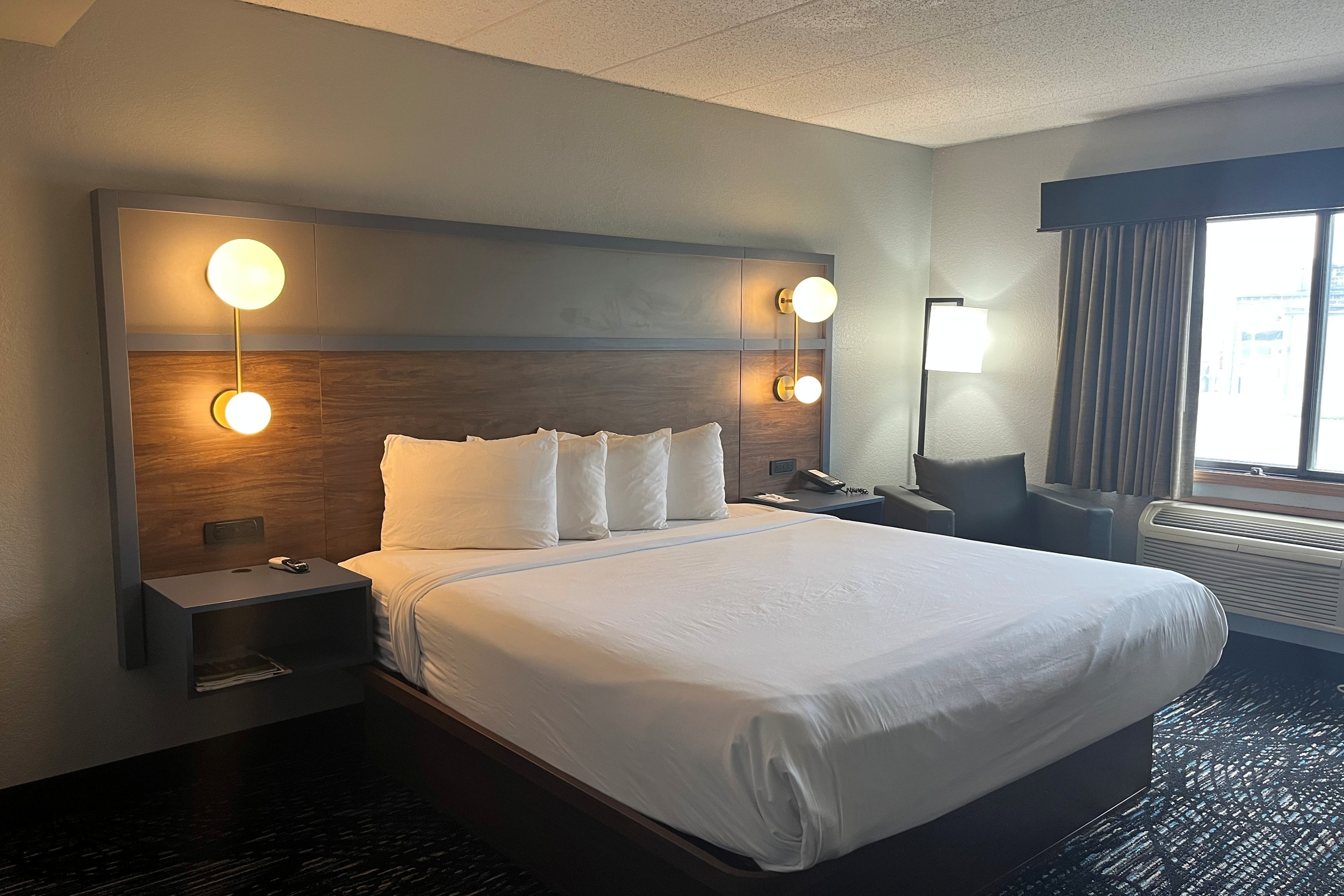 Guest room at the AmericInn by Wyndham Lincoln North in Lincoln, Nebraska