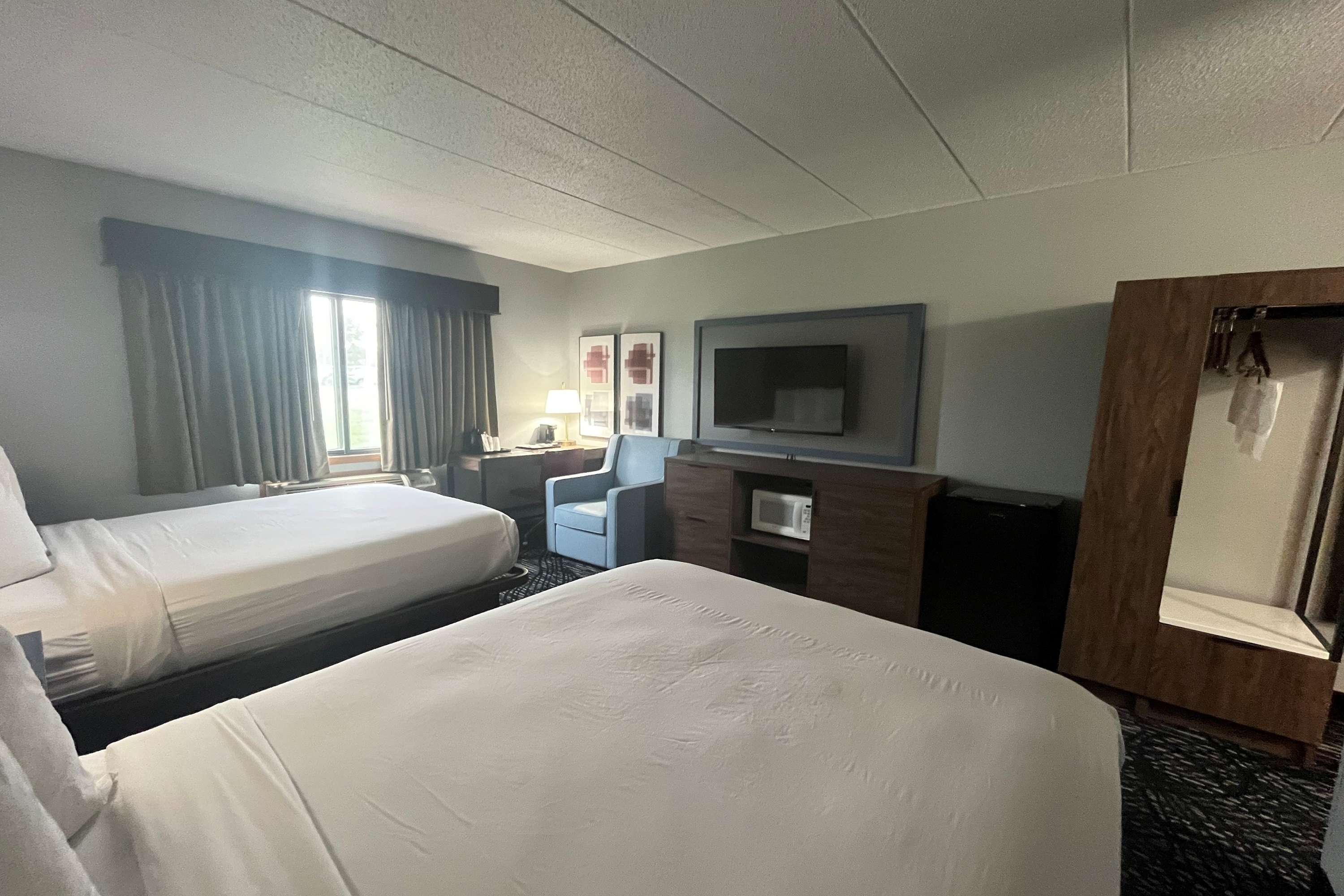 Guest room at the AmericInn by Wyndham Lincoln North in Lincoln, Nebraska
