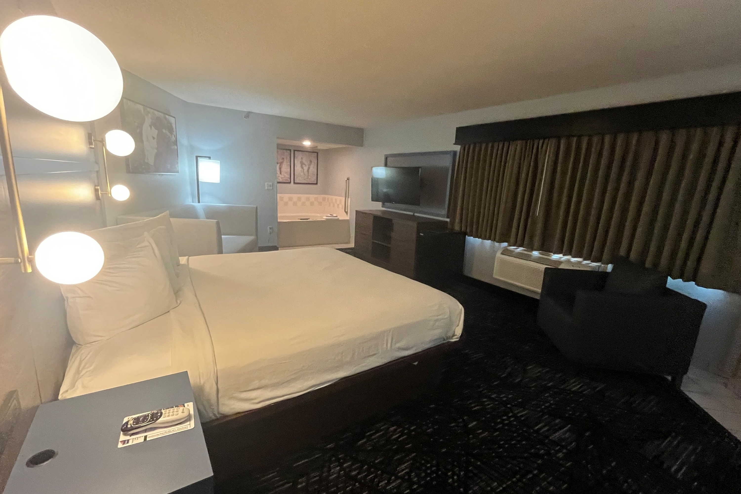 Guest room at the AmericInn by Wyndham Lincoln North in Lincoln, Nebraska