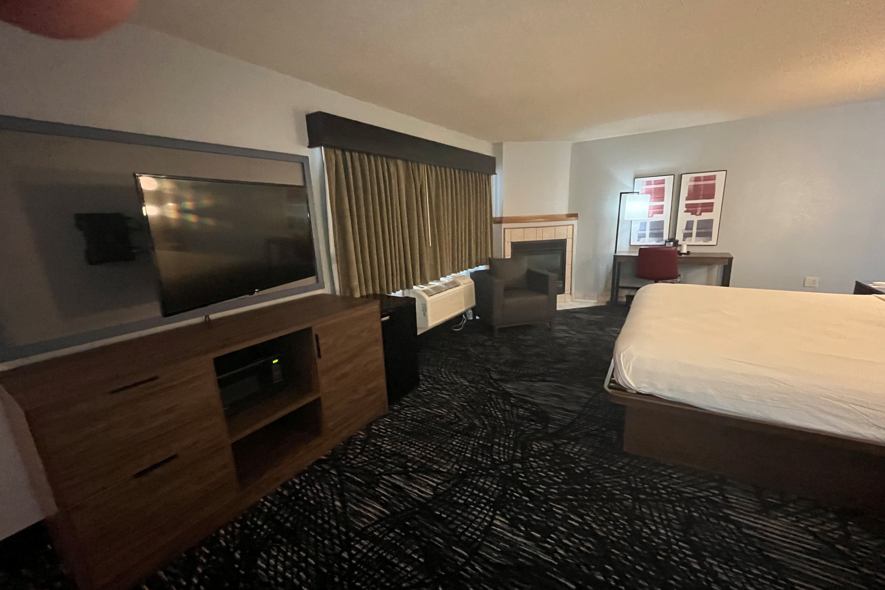 Guest room at the AmericInn by Wyndham Lincoln North in Lincoln, Nebraska