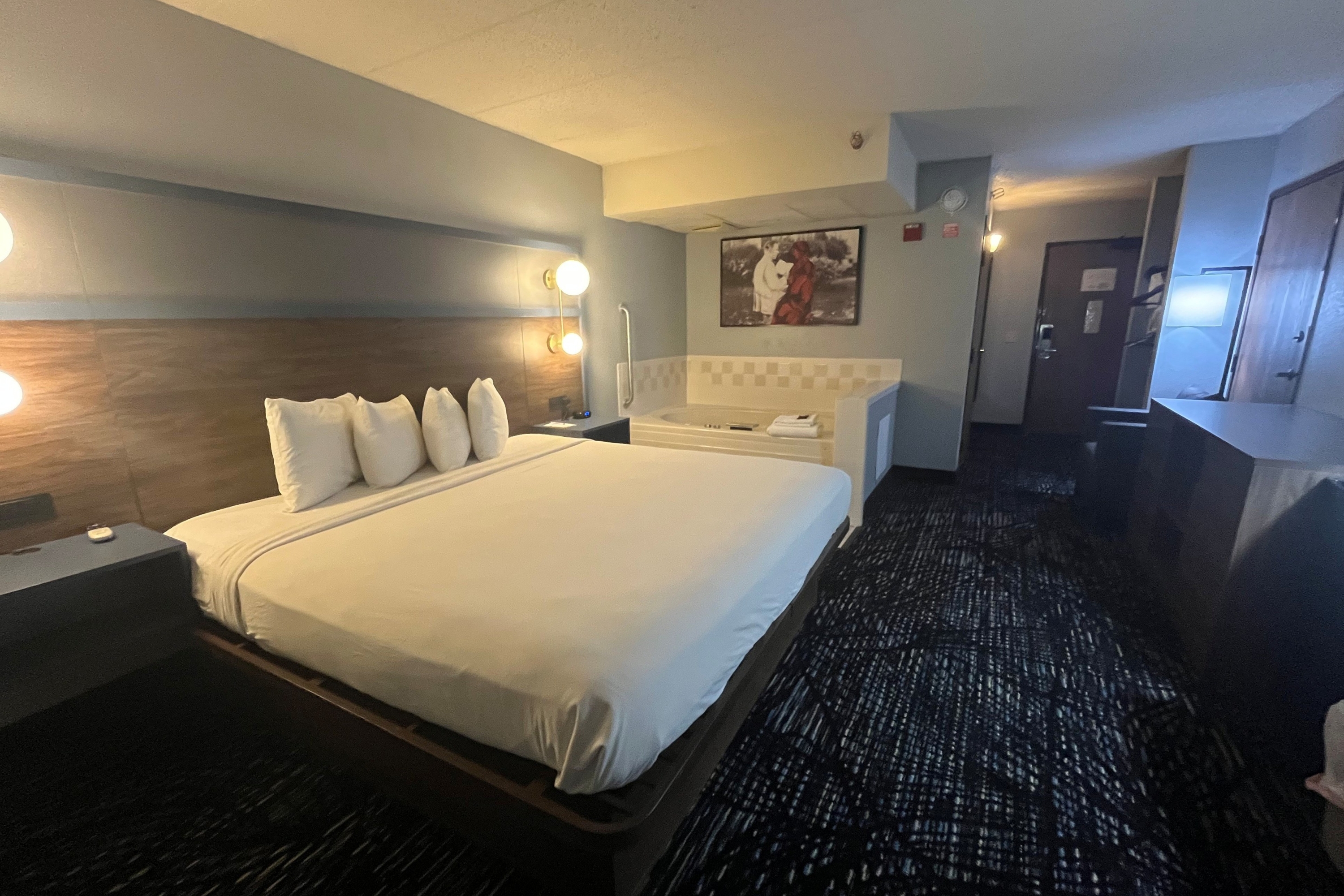 Guest room at the AmericInn by Wyndham Lincoln North in Lincoln, Nebraska