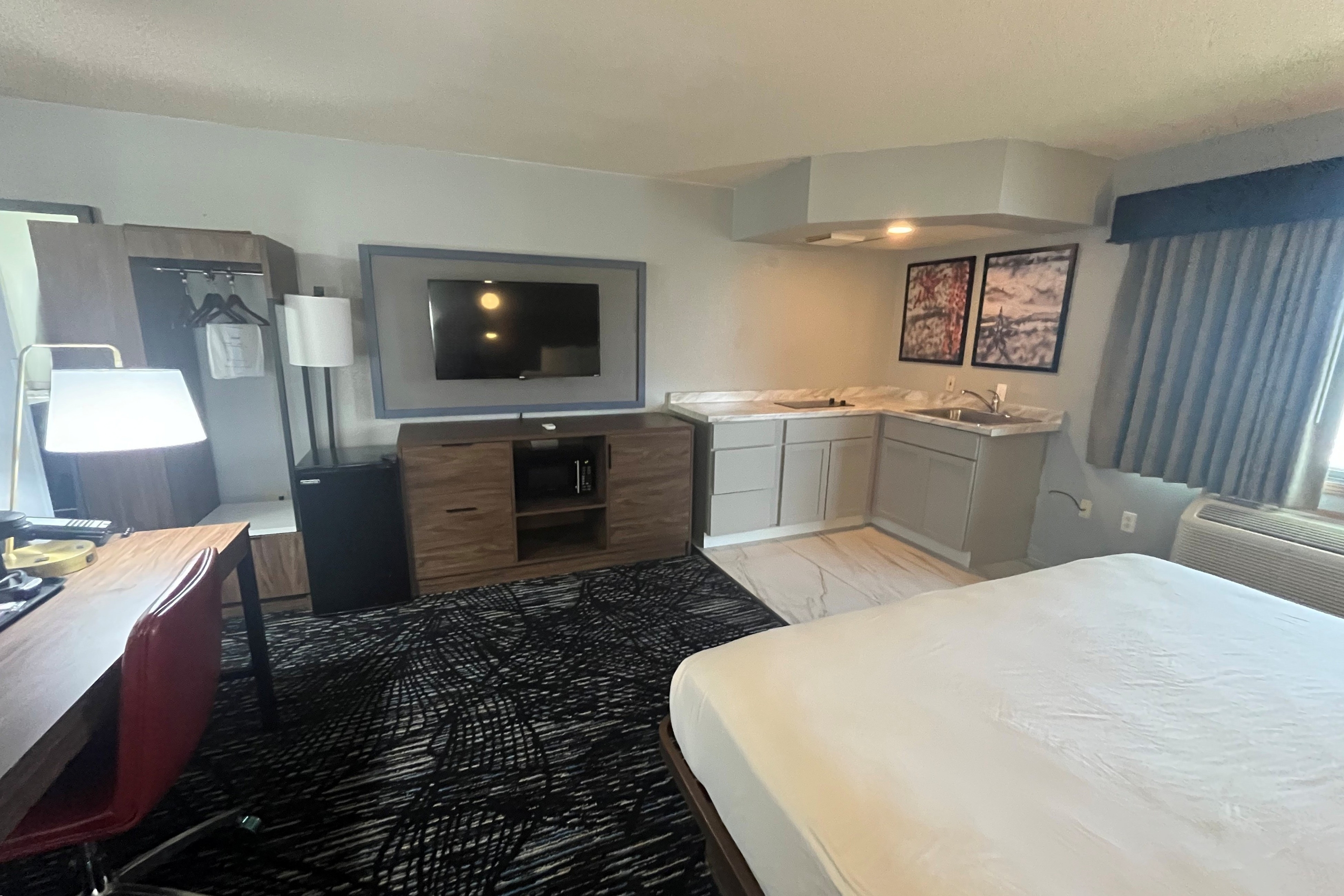 Guest room at the AmericInn by Wyndham Lincoln North in Lincoln, Nebraska