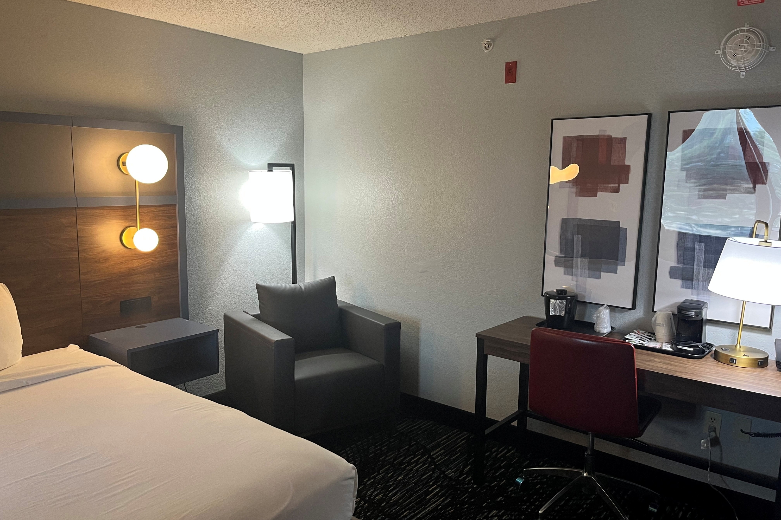 Guest room at the AmericInn by Wyndham Lincoln North in Lincoln, Nebraska