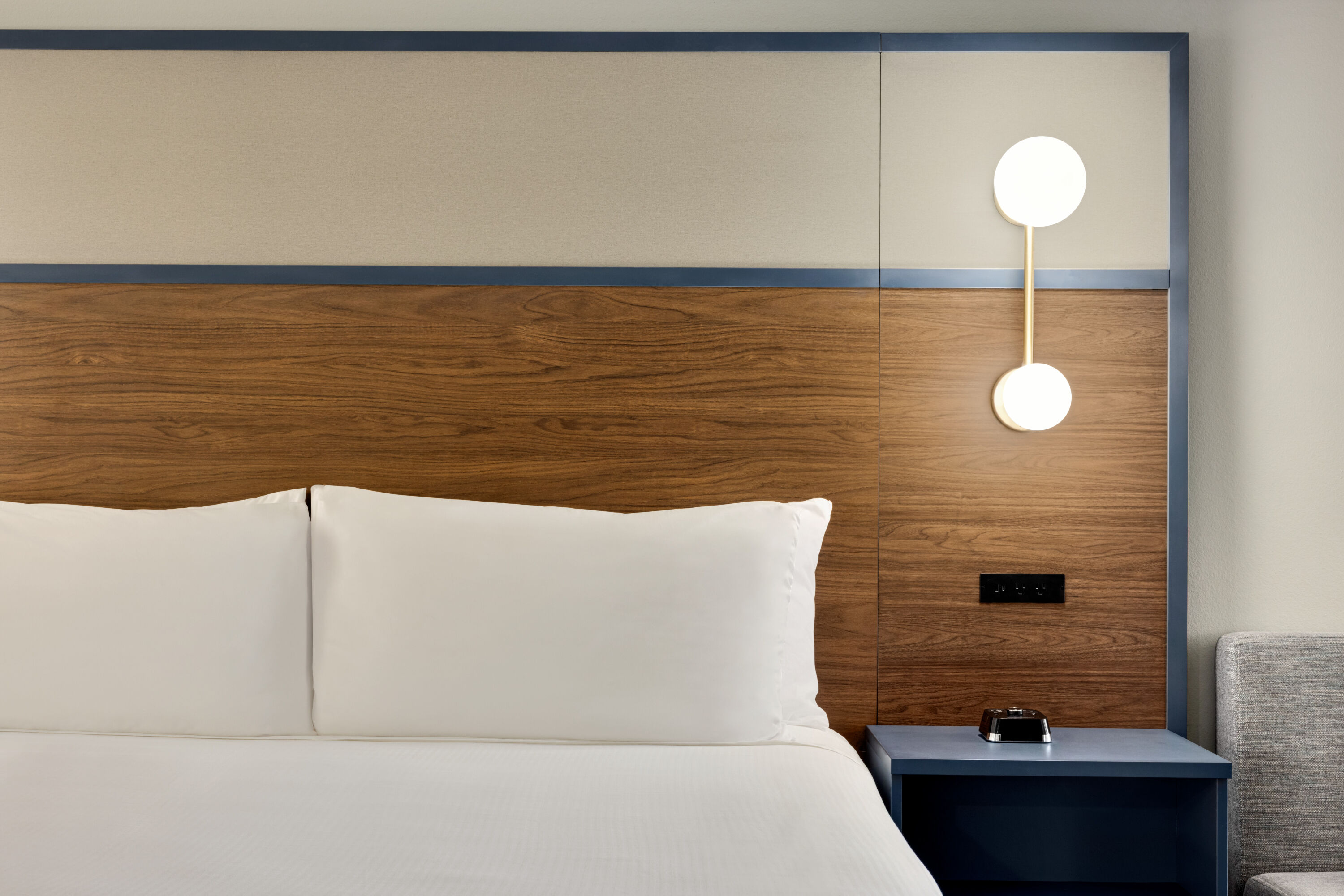 Guest room at the AmericInn by Wyndham Lincoln South in Lincoln, Nebraska