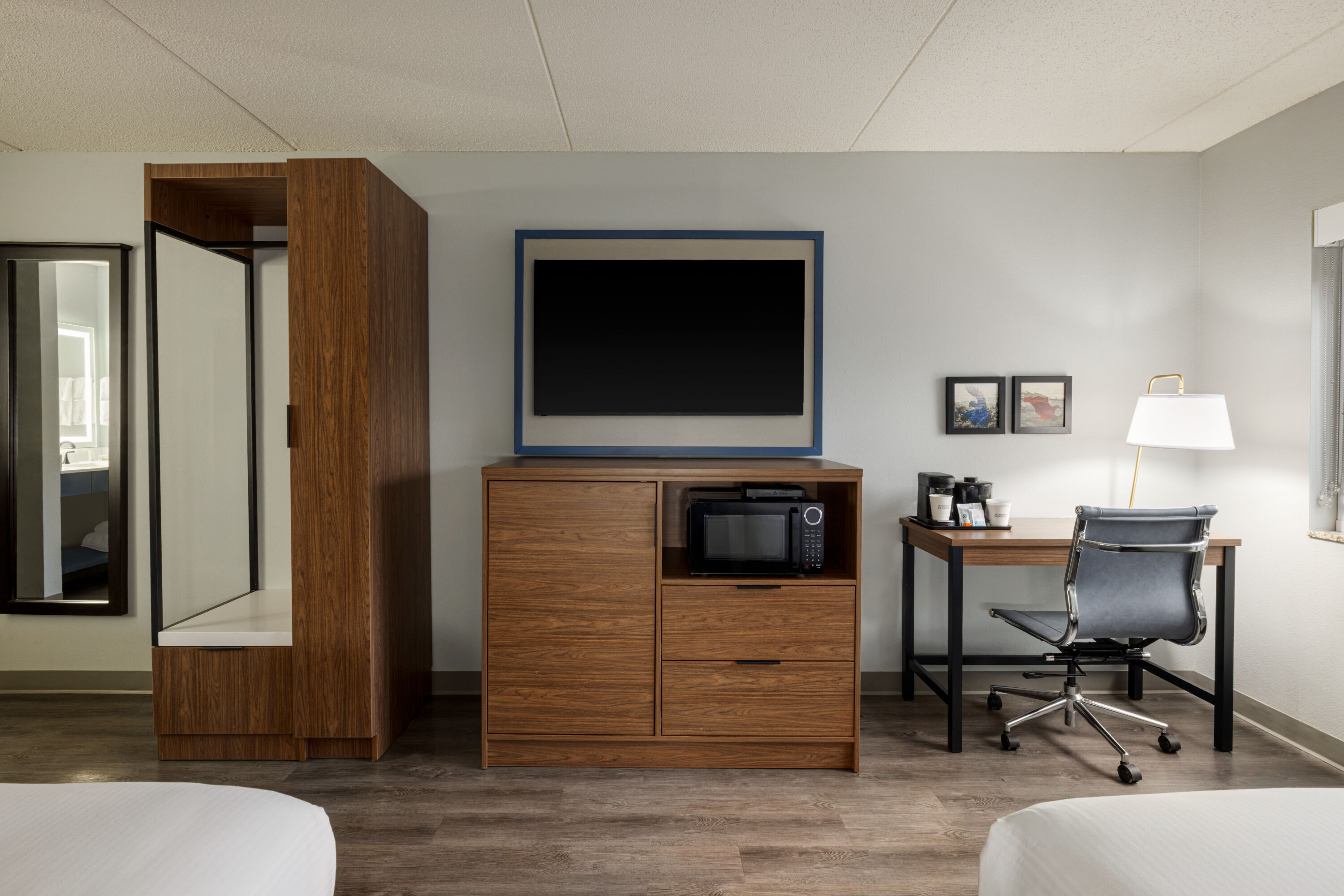 Guest room at the AmericInn by Wyndham Lincoln South in Lincoln, Nebraska