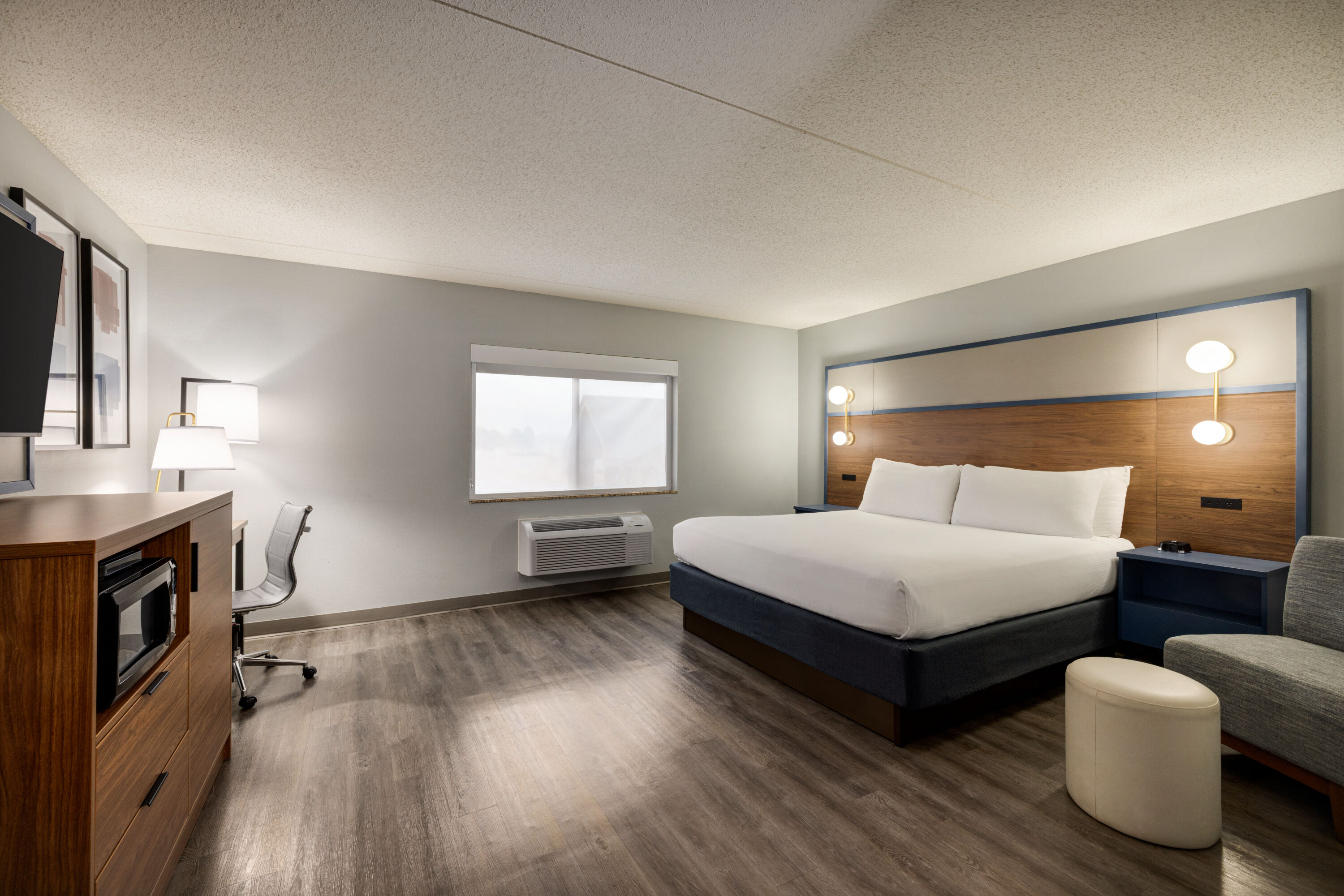 Guest room at the AmericInn by Wyndham Lincoln South in Lincoln, Nebraska