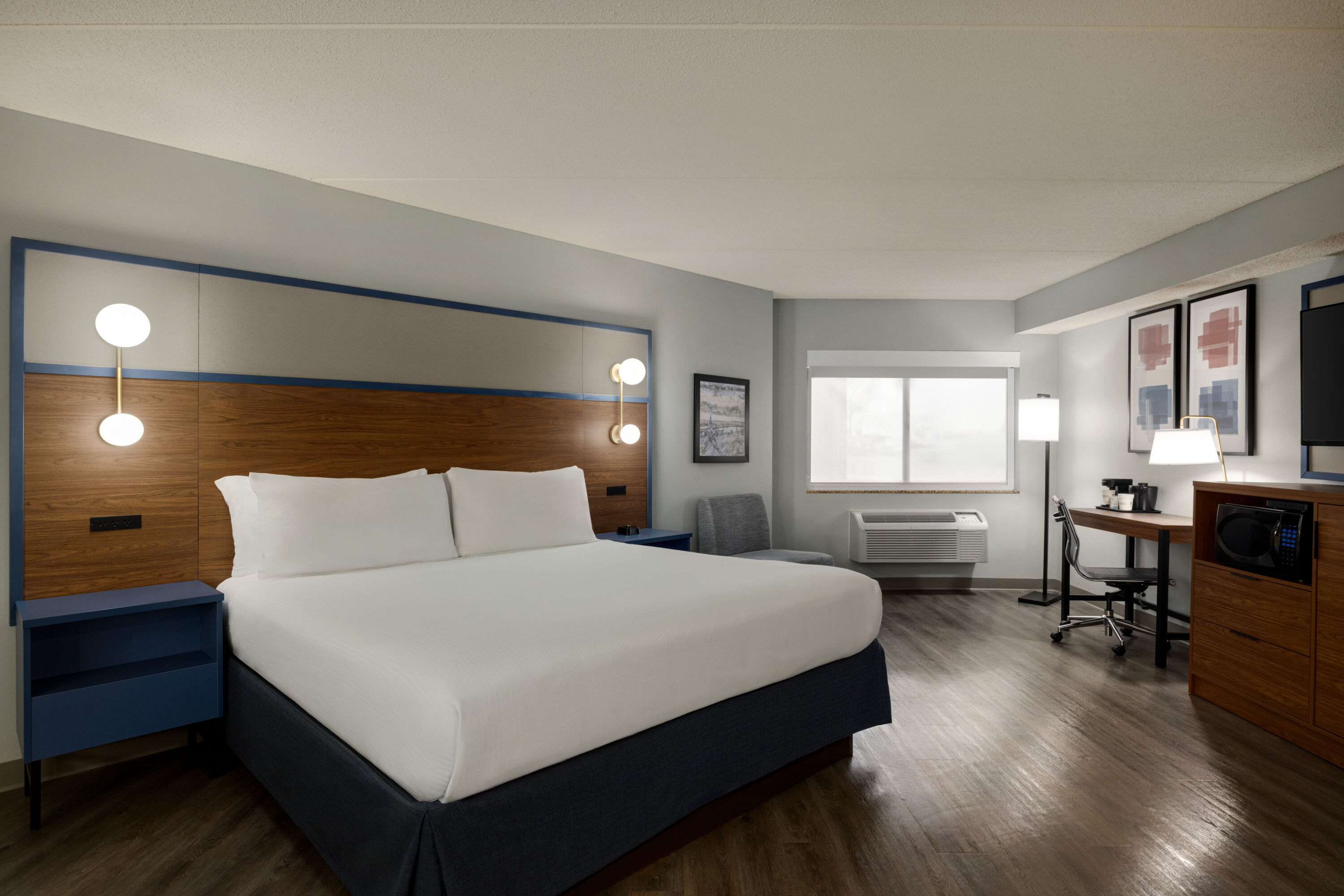 Guest room at the AmericInn by Wyndham Lincoln South in Lincoln, Nebraska