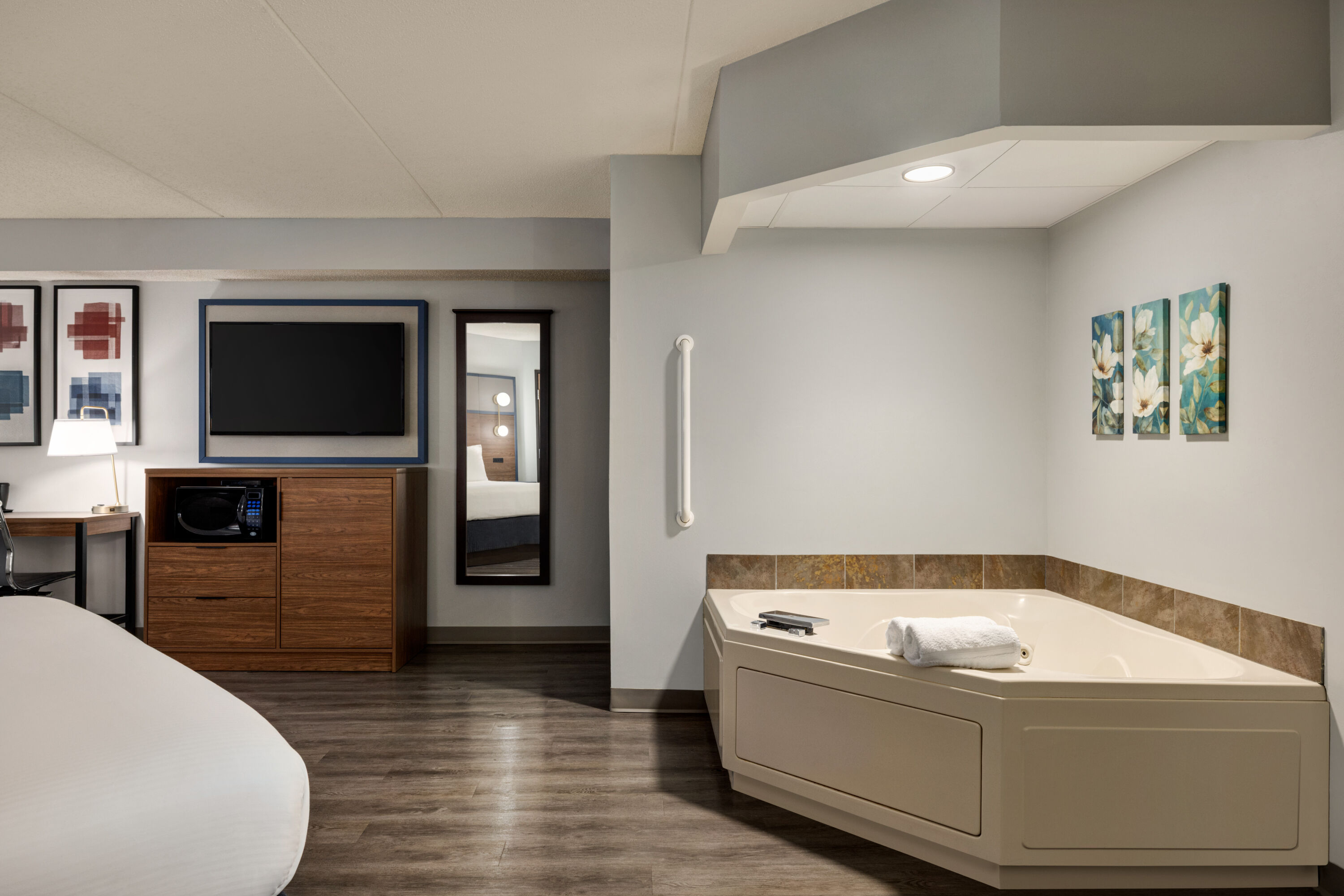 Guest room at the AmericInn by Wyndham Lincoln South in Lincoln, Nebraska