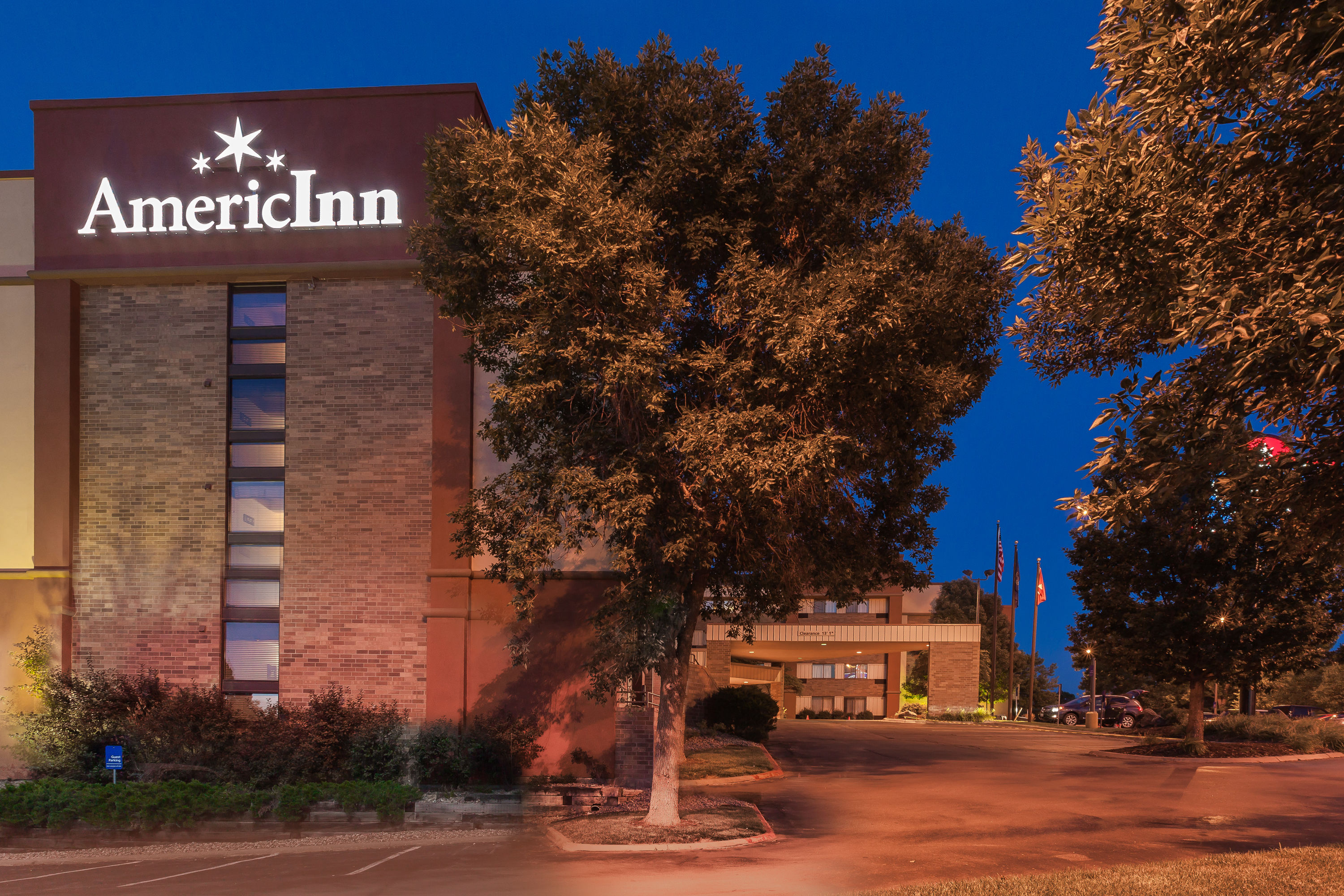 Exterior Dusk Image of AmericInn by Wyndham Omaha hotel in Omaha, Nebraska