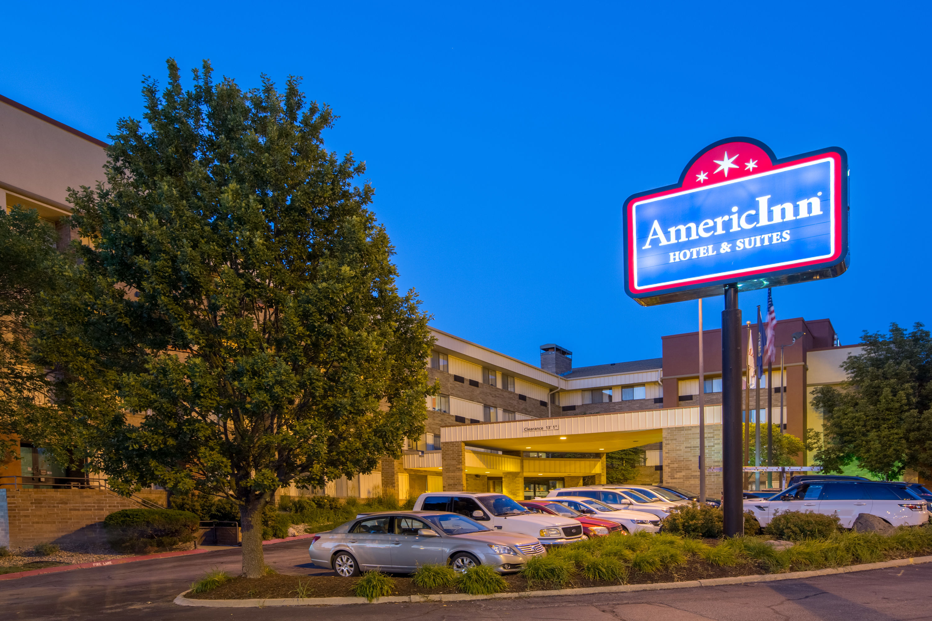 Exterior Dusk Image of AmericInn by Wyndham Omaha hotel in Omaha, Nebraska