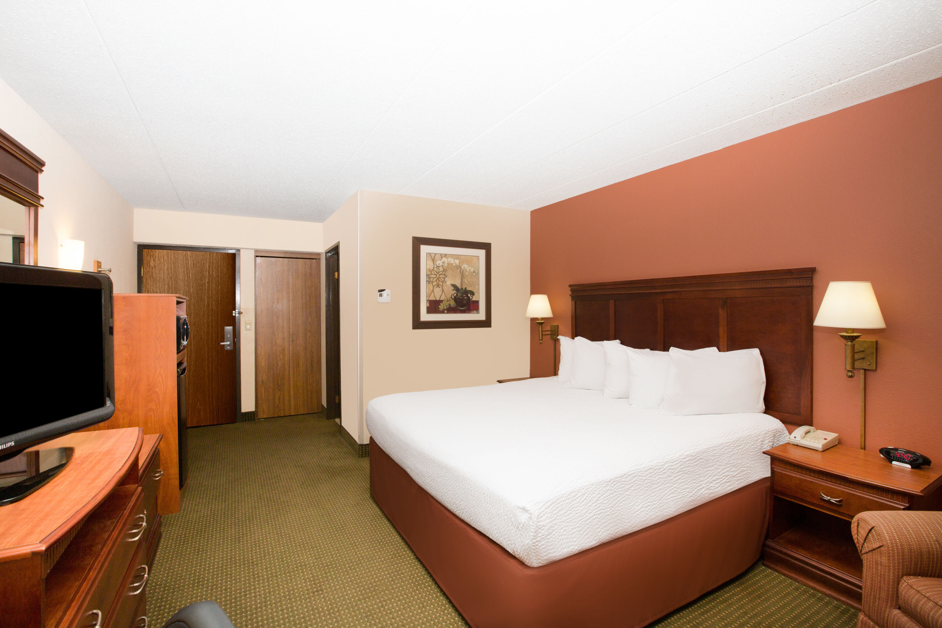 Guest room at the AmericInn by Wyndham Omaha in Omaha, Nebraska
