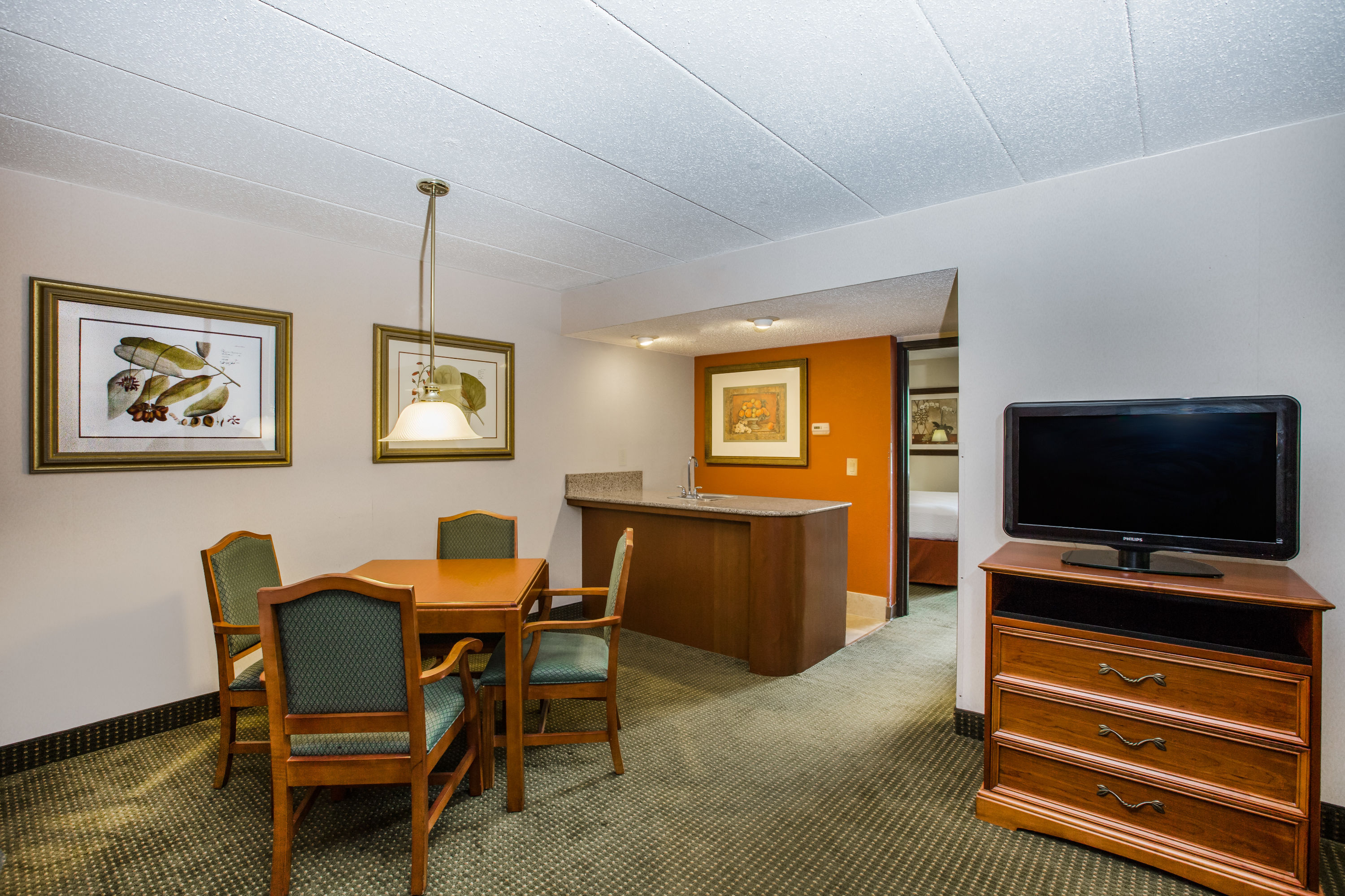 AmericInn by Wyndham Omaha suite living room in Omaha, Nebraska