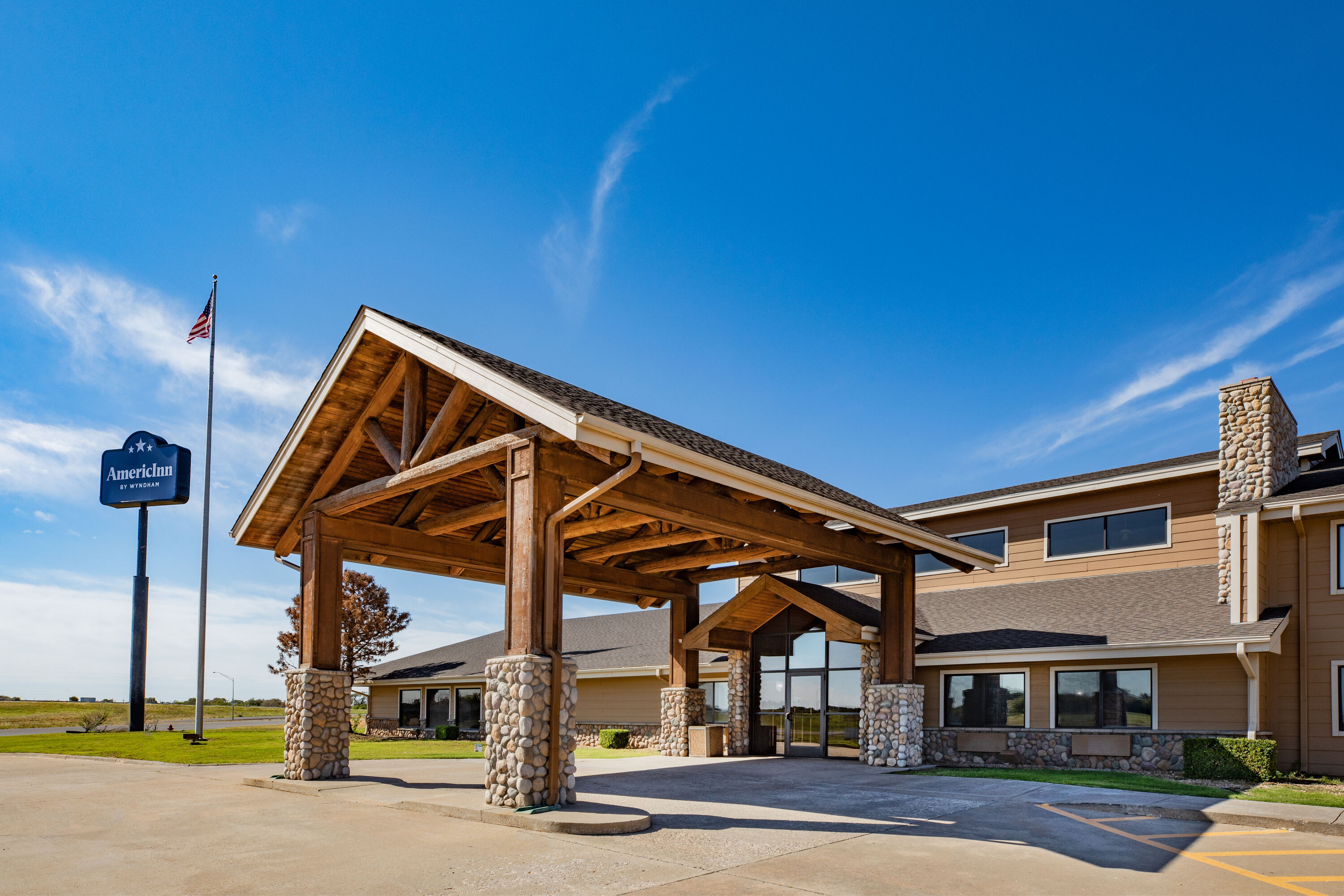 Exterior Day Image of AmericInn by Wyndham Sayre hotel in Sayre, Oklahoma