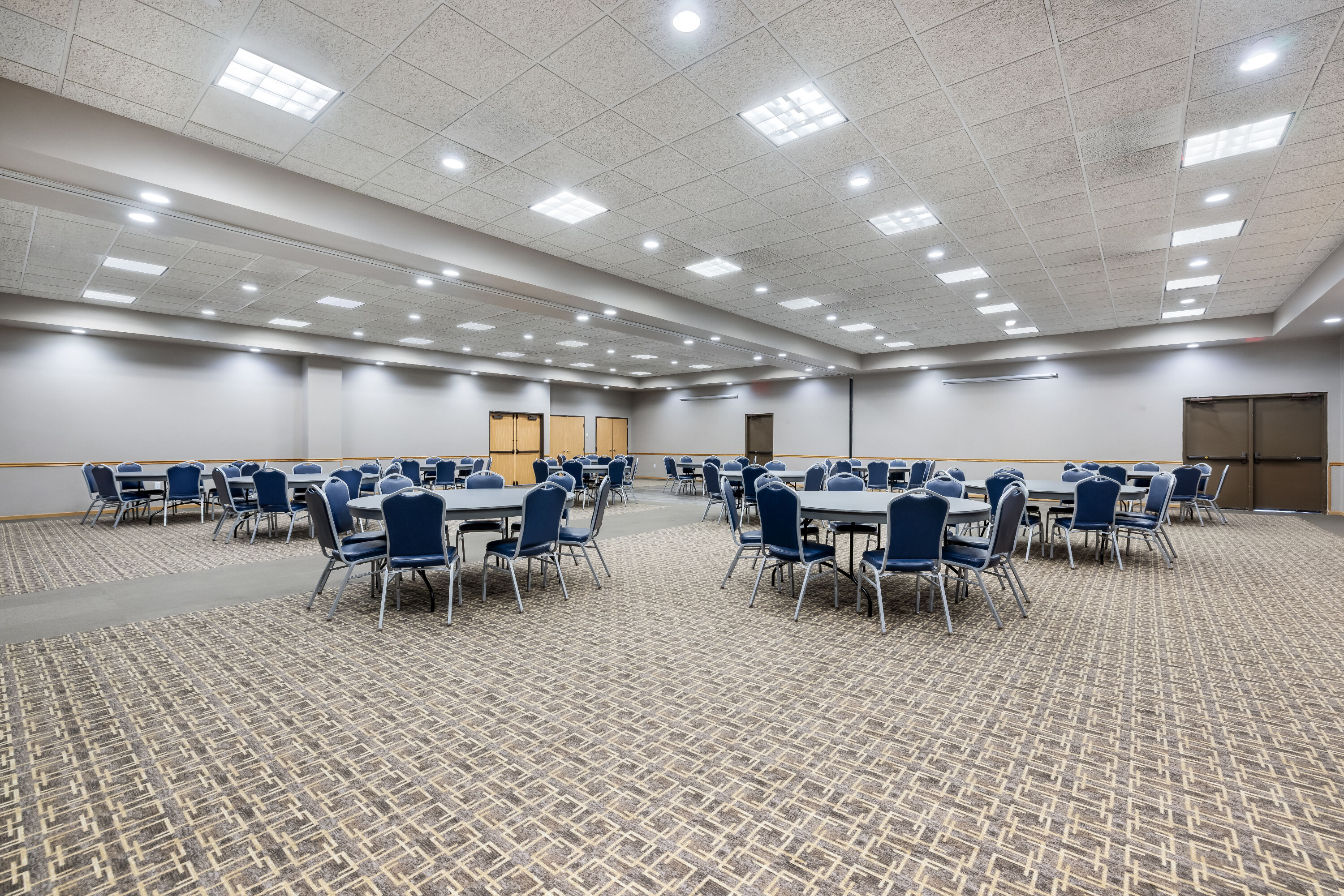 Meeting room banquet rounds at AmericInn by Wyndham Aberdeen Event Center in Aberdeen, South Dakota