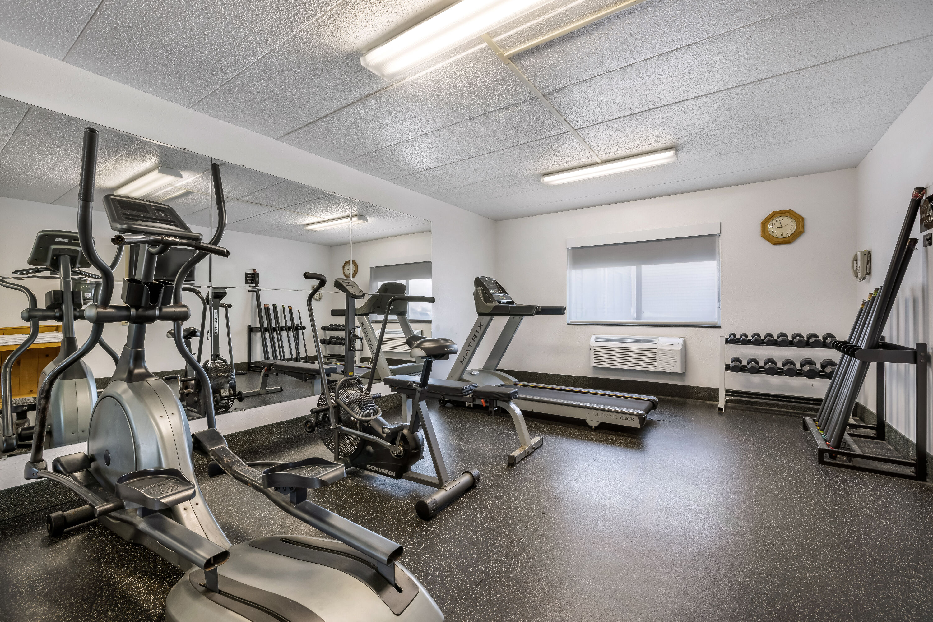 Fitness room at AmericInn by Wyndham Aberdeen Event Center in Aberdeen, South Dakota