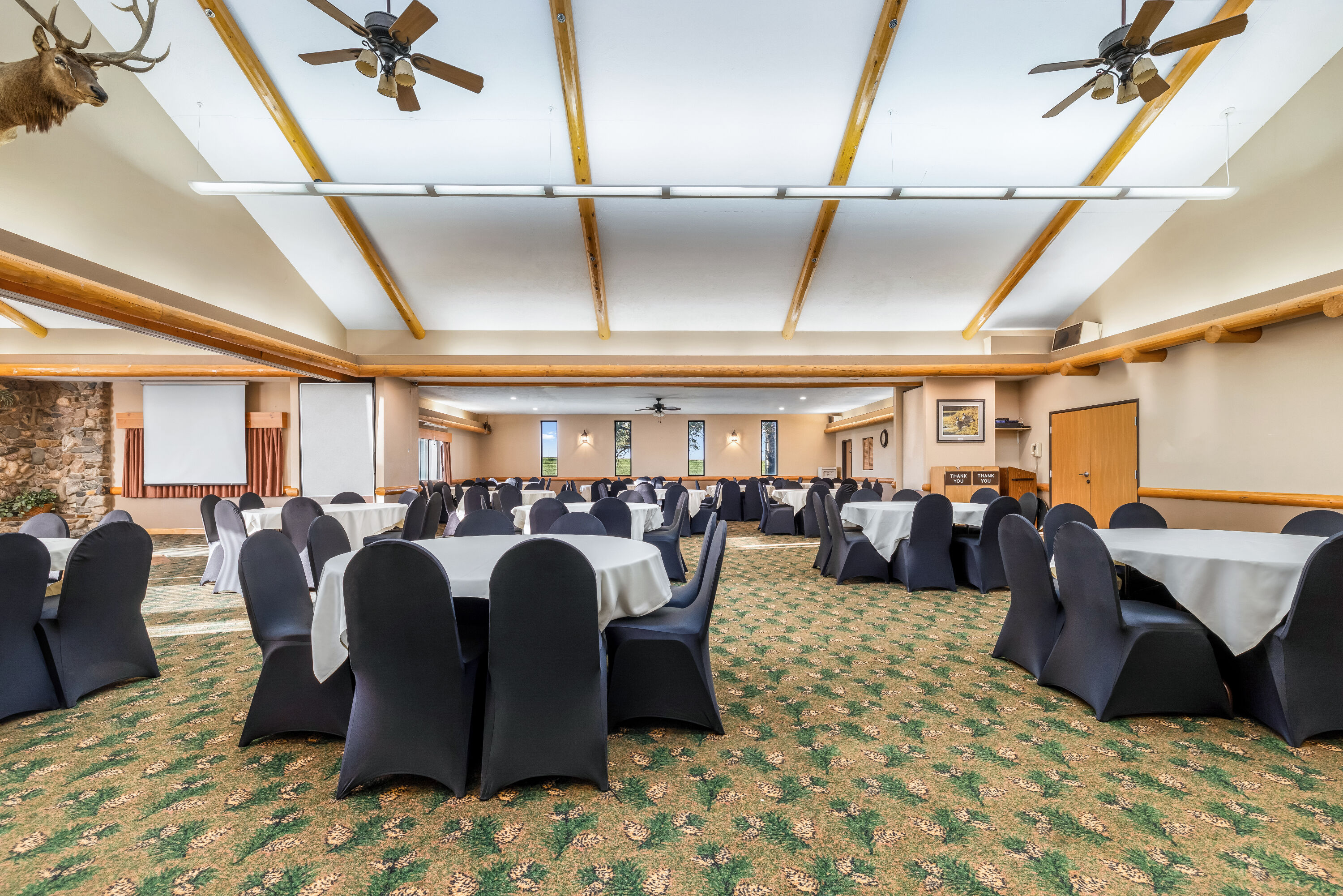 Meeting room banquet rounds at AmericInn by Wyndham Chamberlain Conference Center in Chamberlain, South Dakota