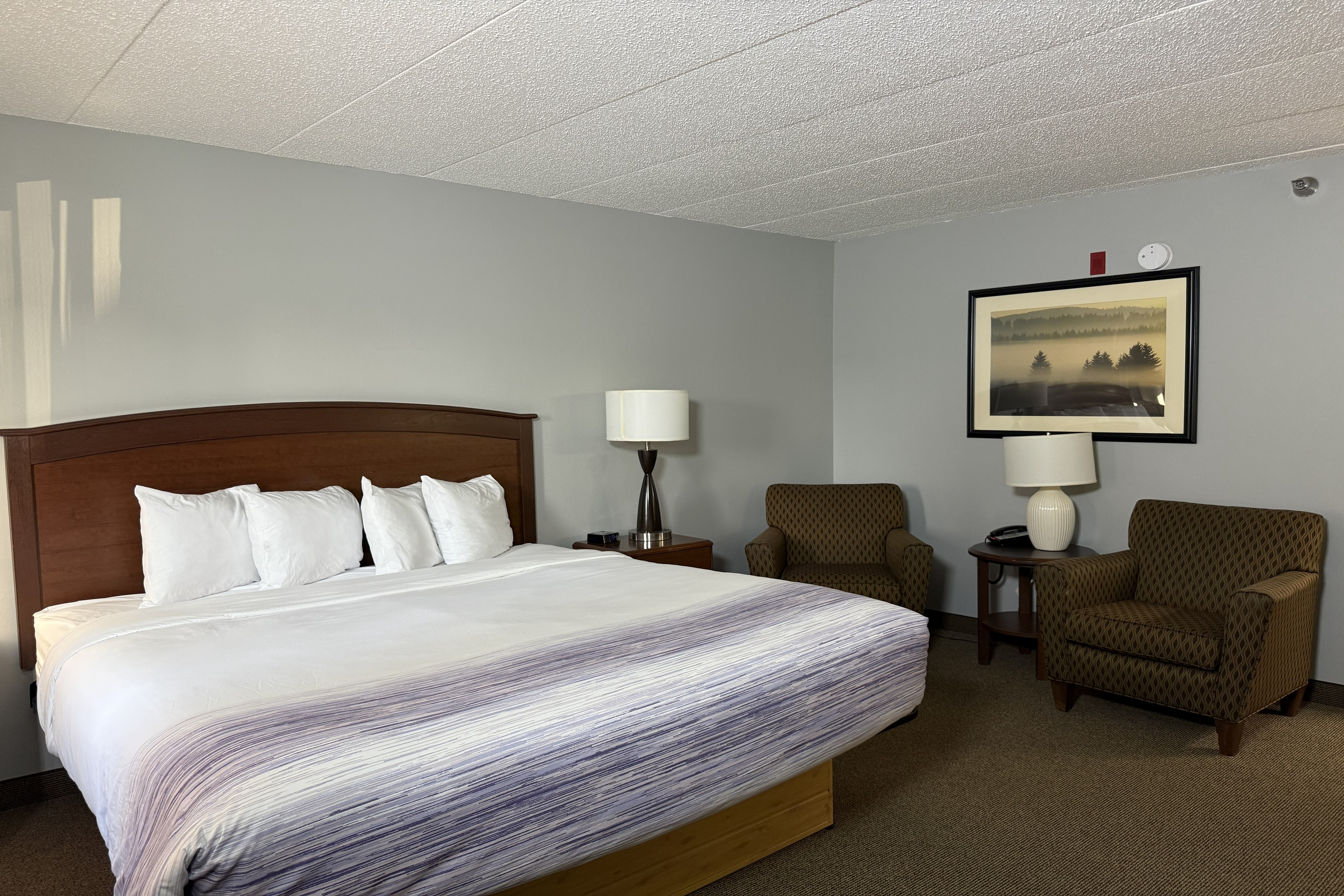 Guest room at the AmericInn by Wyndham Sioux Falls in Sioux Falls, South Dakota