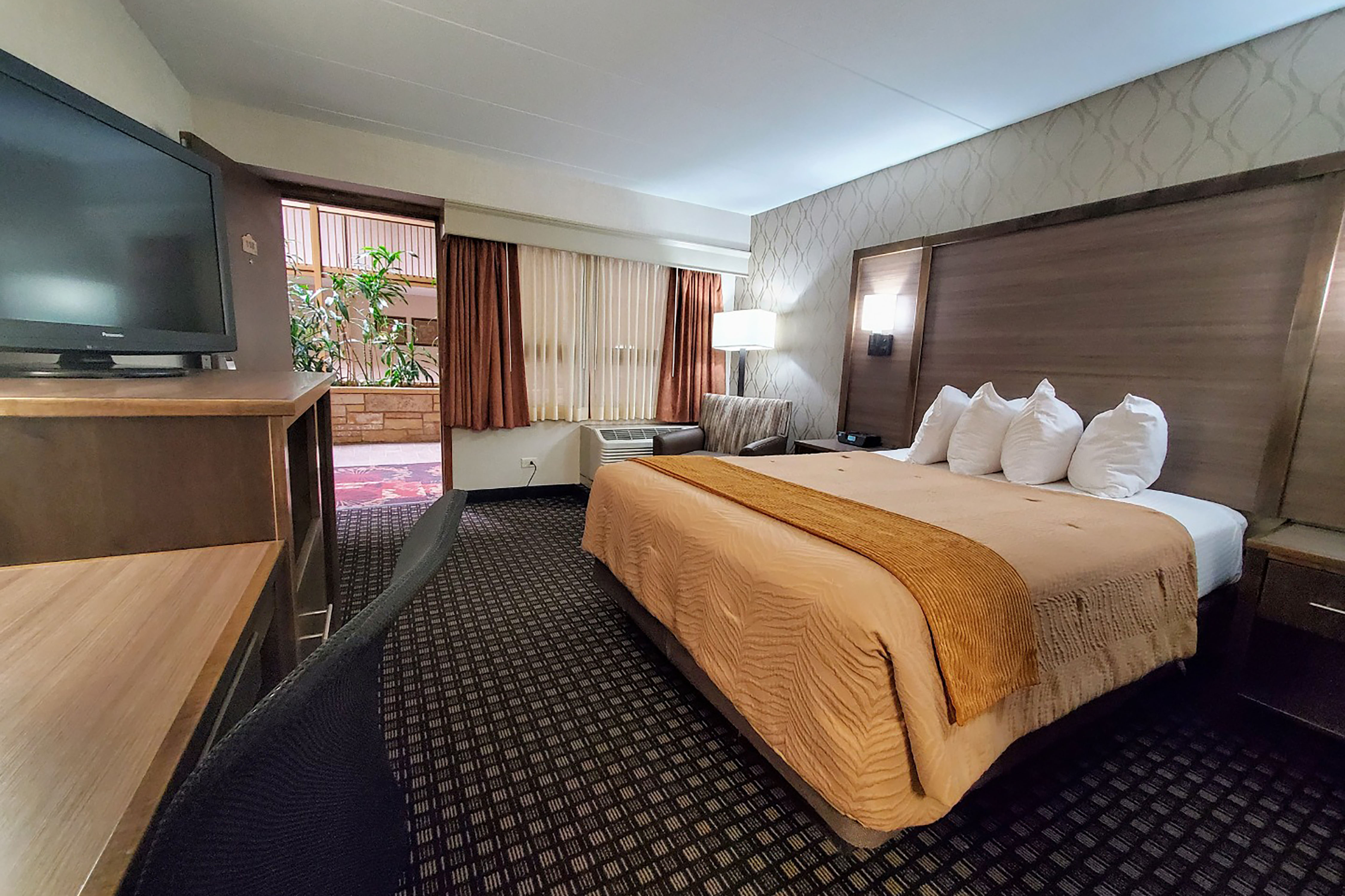 Guest room at the AmericInn by Wyndham Watertown in Watertown, South Dakota