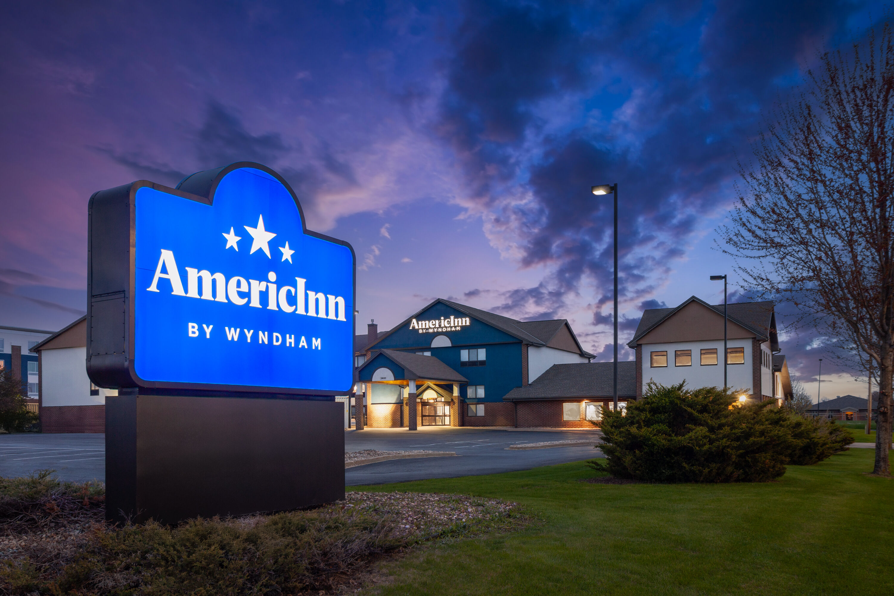 Exterior Dusk Image of AmericInn by Wyndham Appleton North/Little Chute hotel in Appleton, Wisconsin