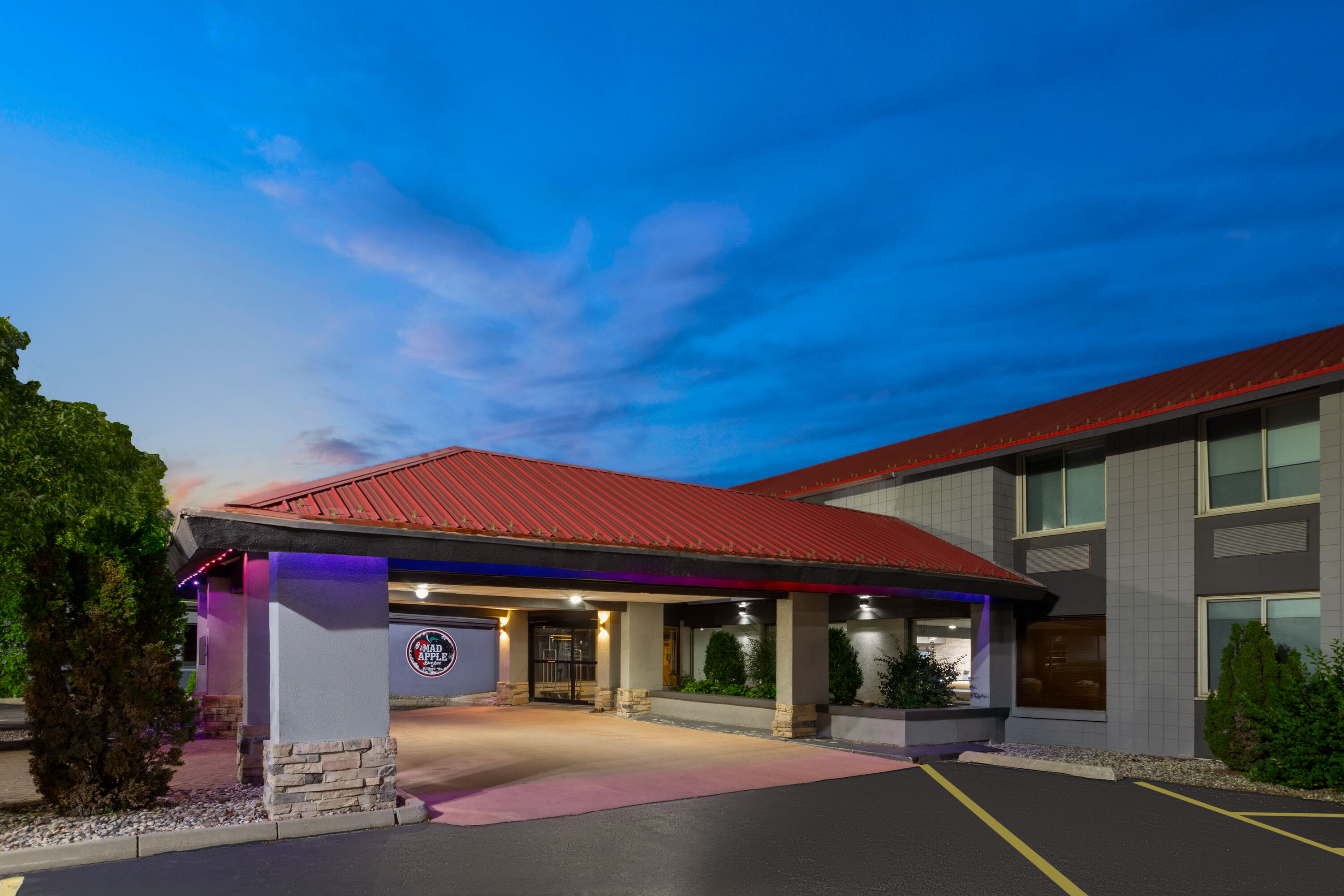 Exterior Dusk Image of AmericInn by Wyndham Appleton Downtown hotel in Appleton, Wisconsin