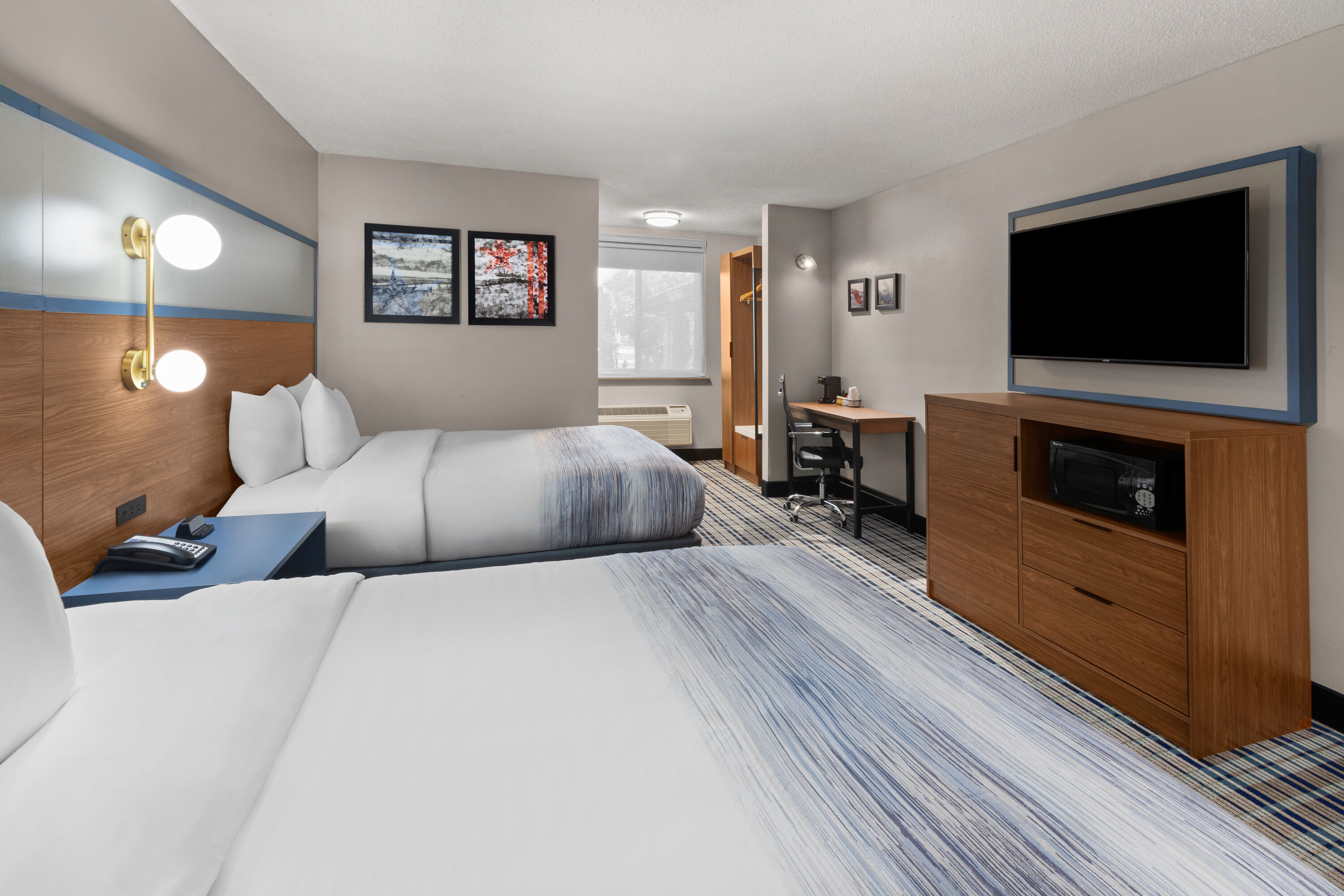 Guest room at the AmericInn by Wyndham Appleton Downtown in Appleton, Wisconsin