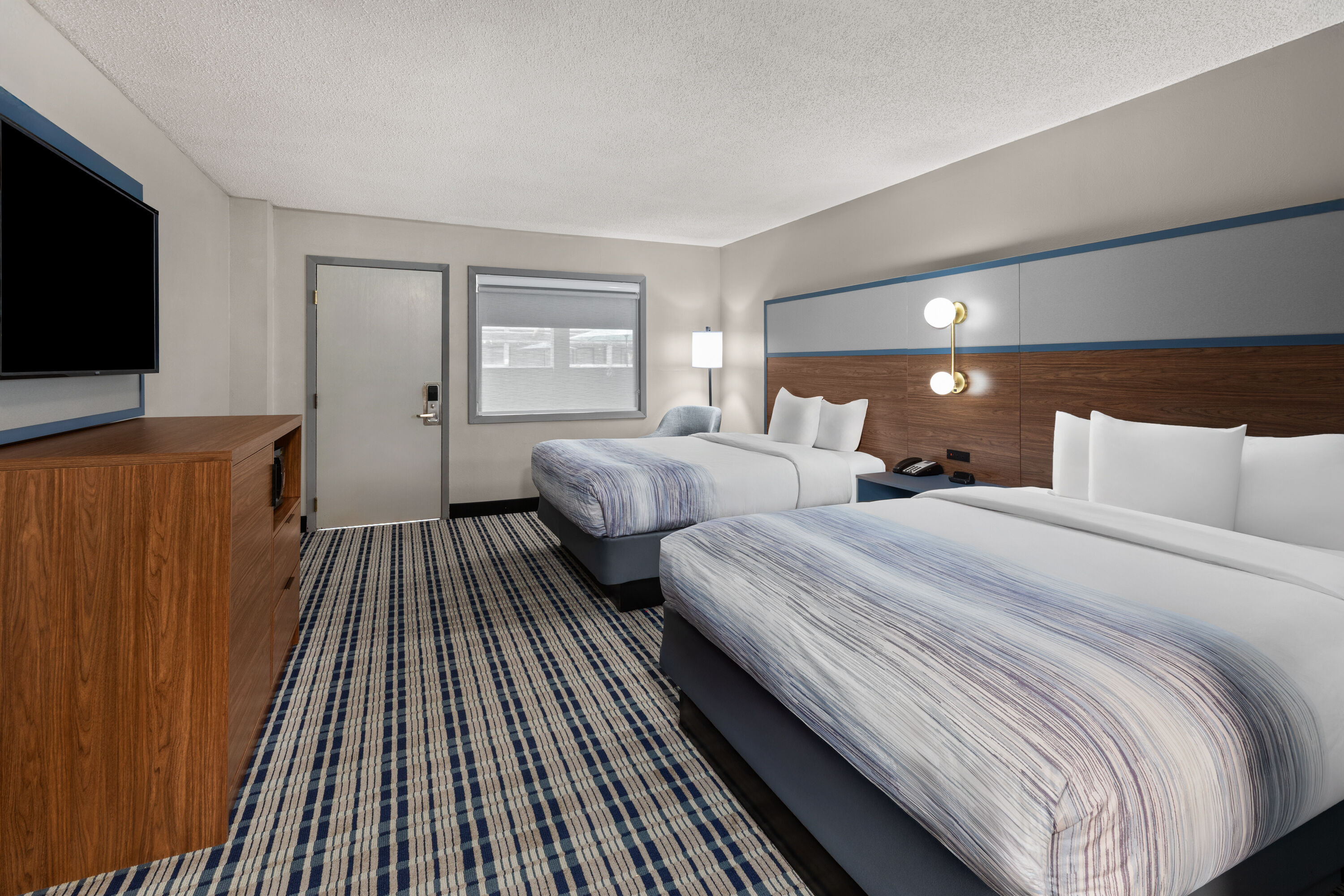 Guest room at the AmericInn by Wyndham Appleton Downtown in Appleton, Wisconsin