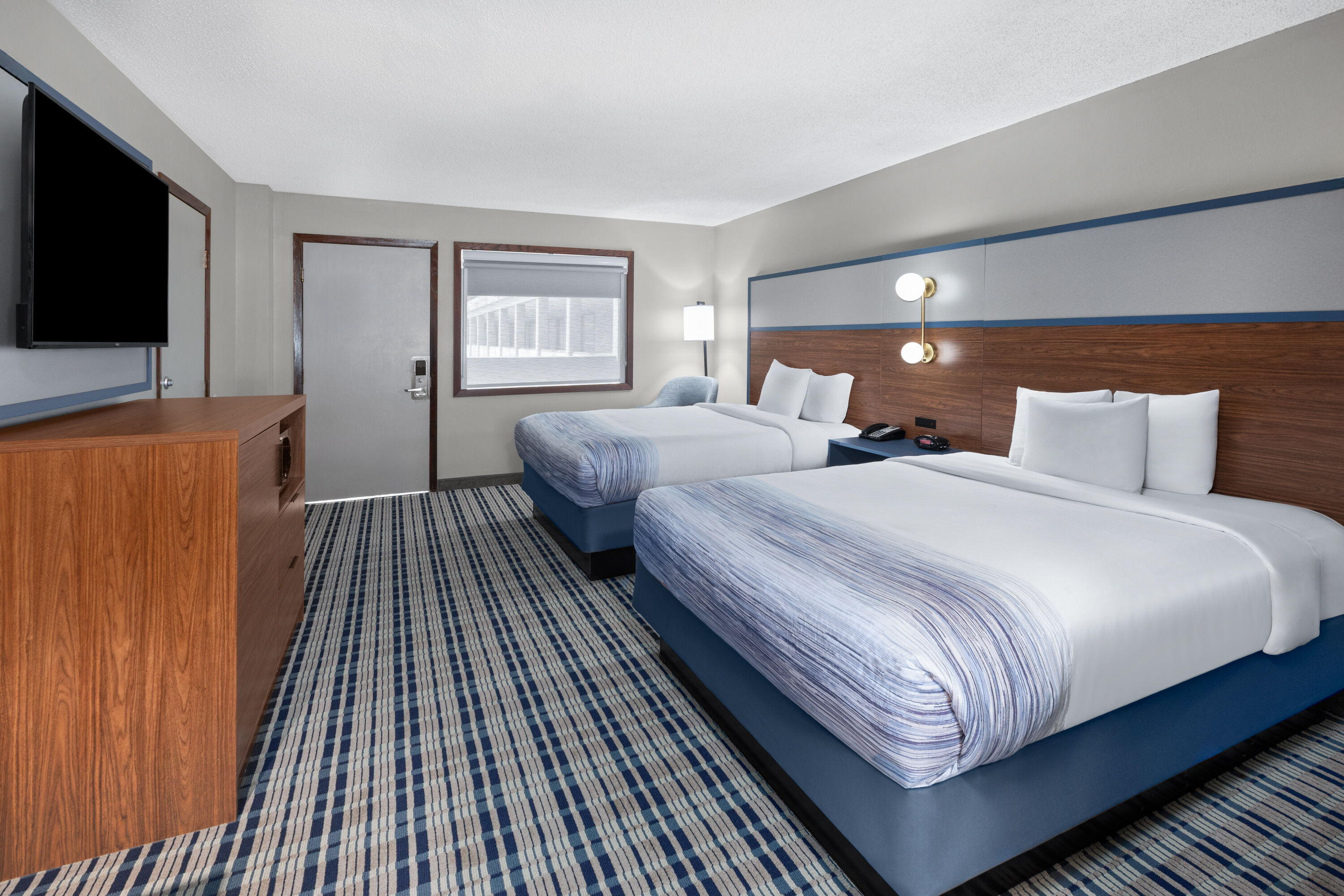 Guest room at the AmericInn by Wyndham Appleton Downtown in Appleton, Wisconsin