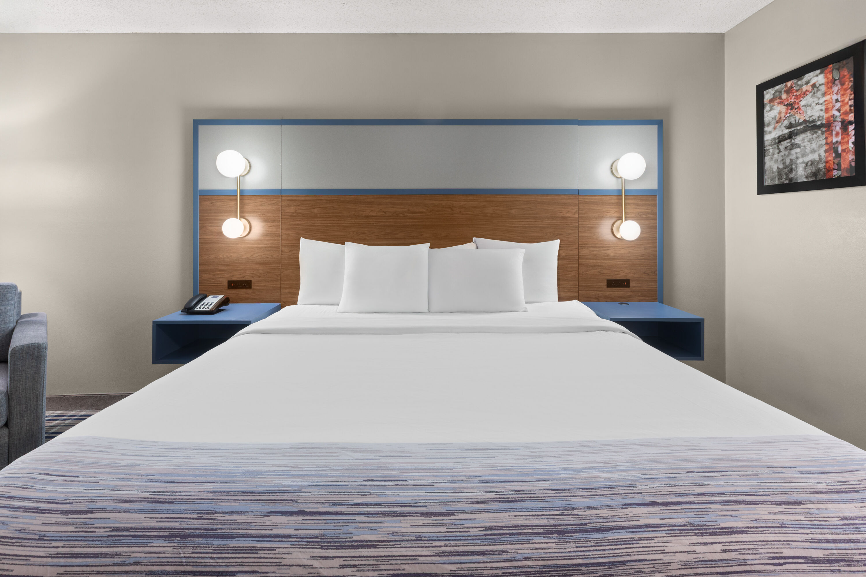 Guest room at the AmericInn by Wyndham Appleton Downtown in Appleton, Wisconsin