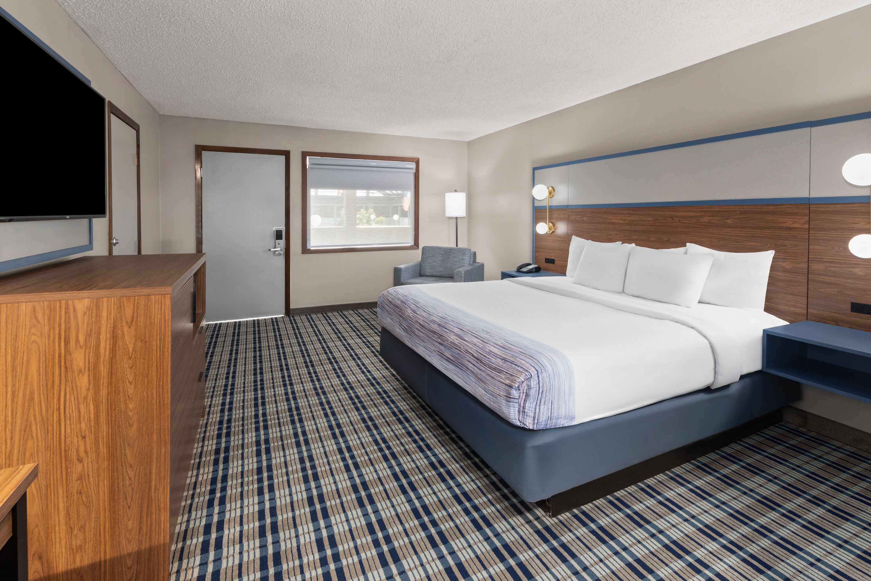 Guest room at the AmericInn by Wyndham Appleton Downtown in Appleton, Wisconsin