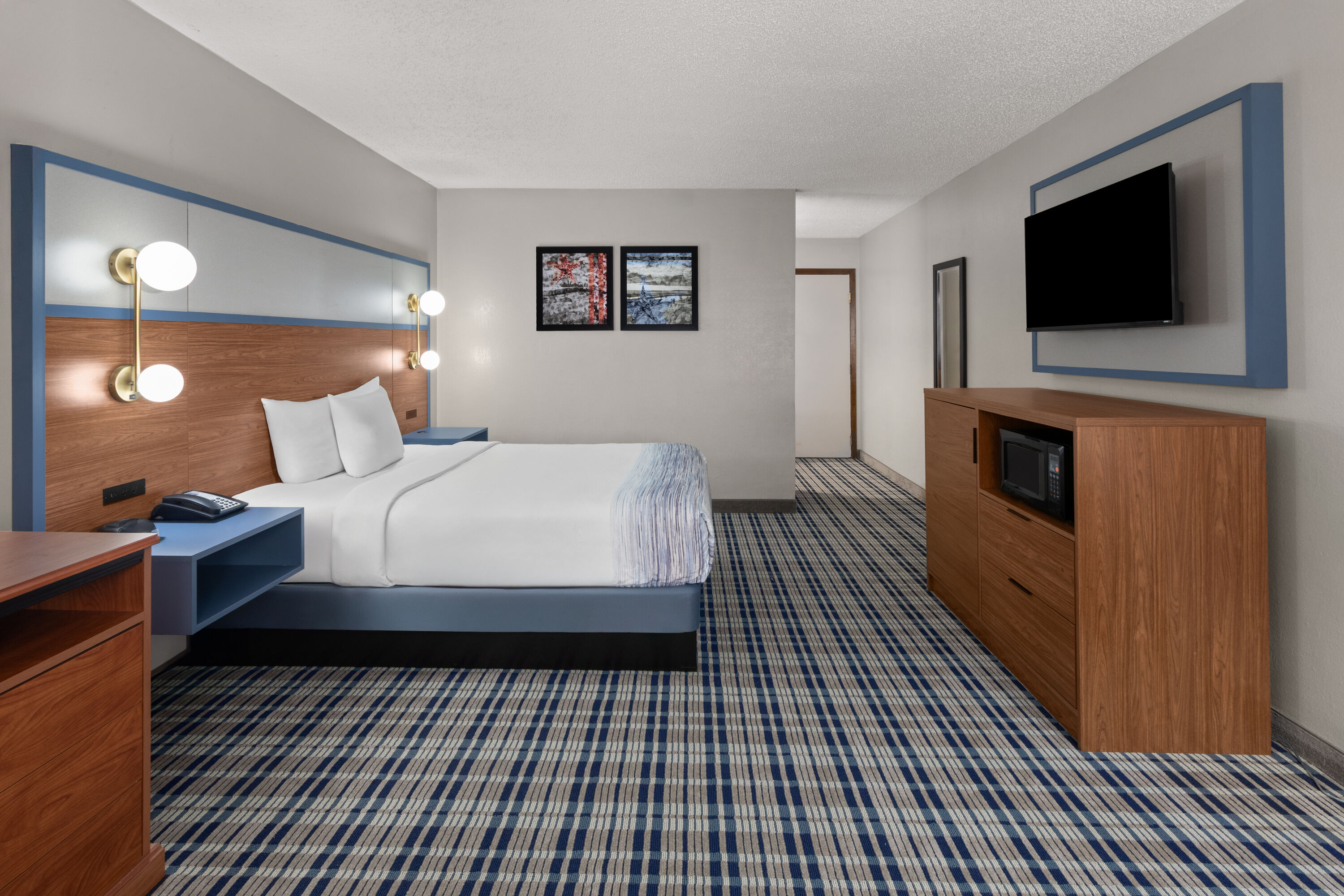 Guest room at the AmericInn by Wyndham Appleton Downtown in Appleton, Wisconsin
