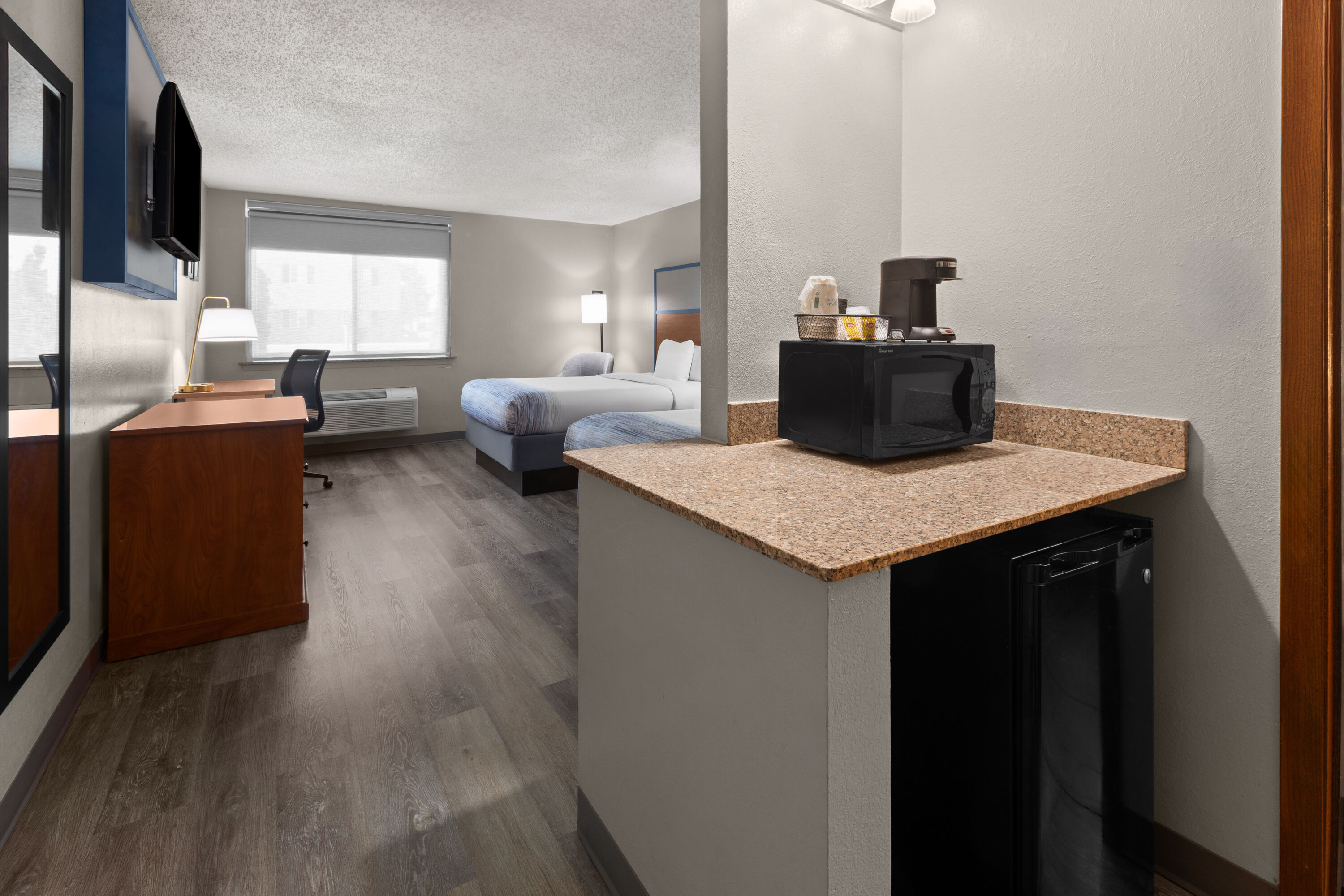 Guest room at the AmericInn by Wyndham Appleton Downtown in Appleton, Wisconsin