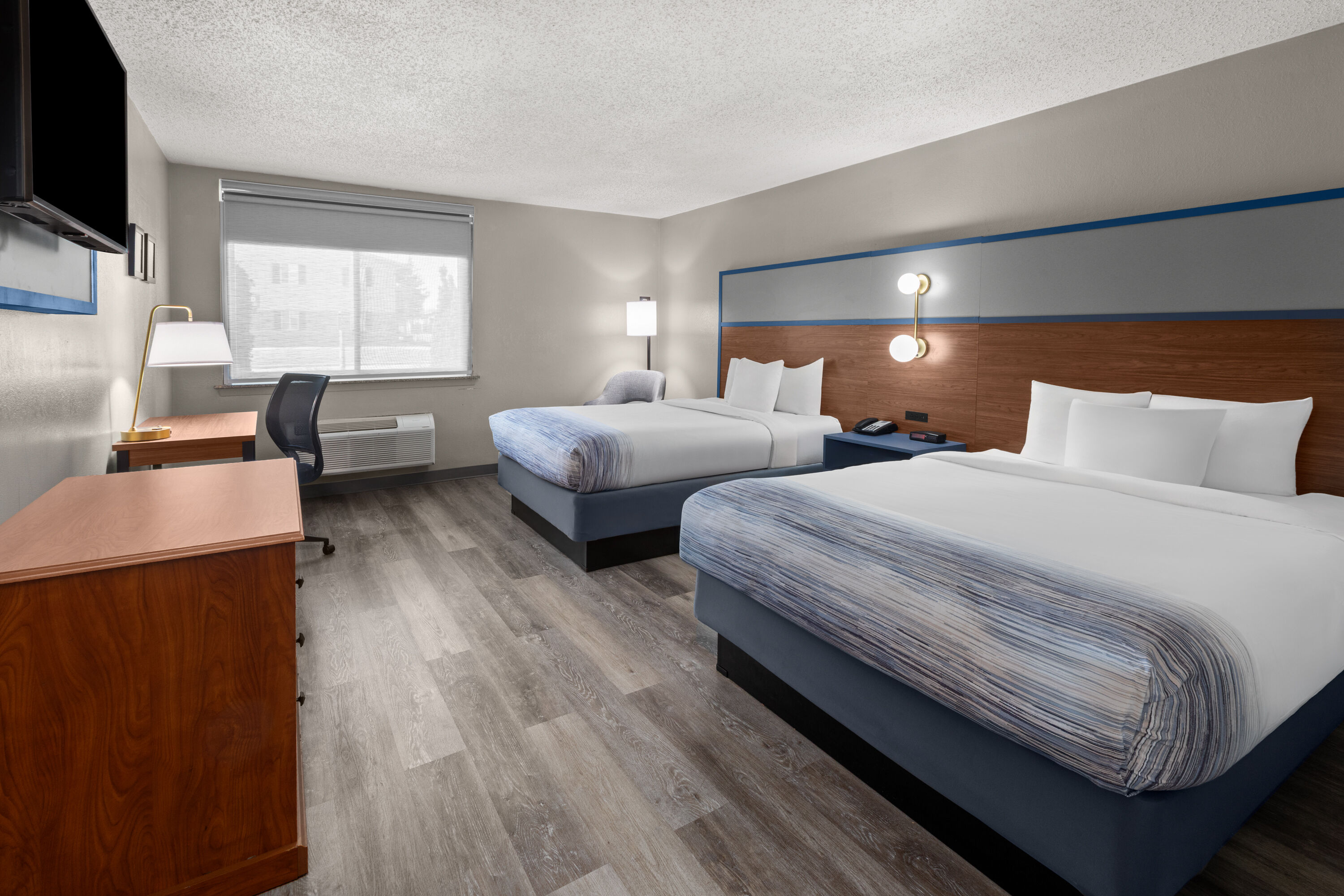 Guest room at the AmericInn by Wyndham Appleton Downtown in Appleton, Wisconsin