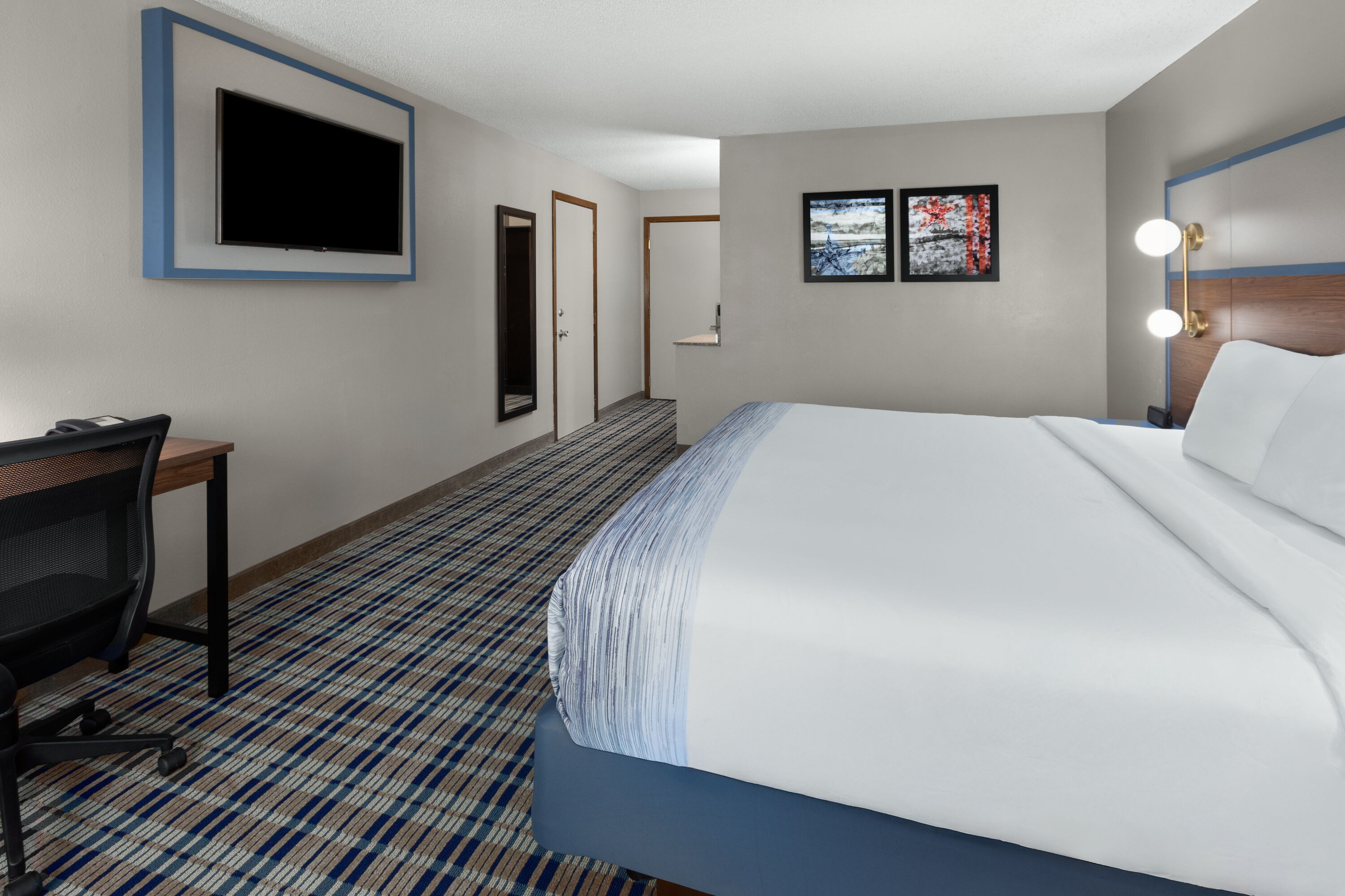 Guest room at the AmericInn by Wyndham Appleton Downtown in Appleton, Wisconsin