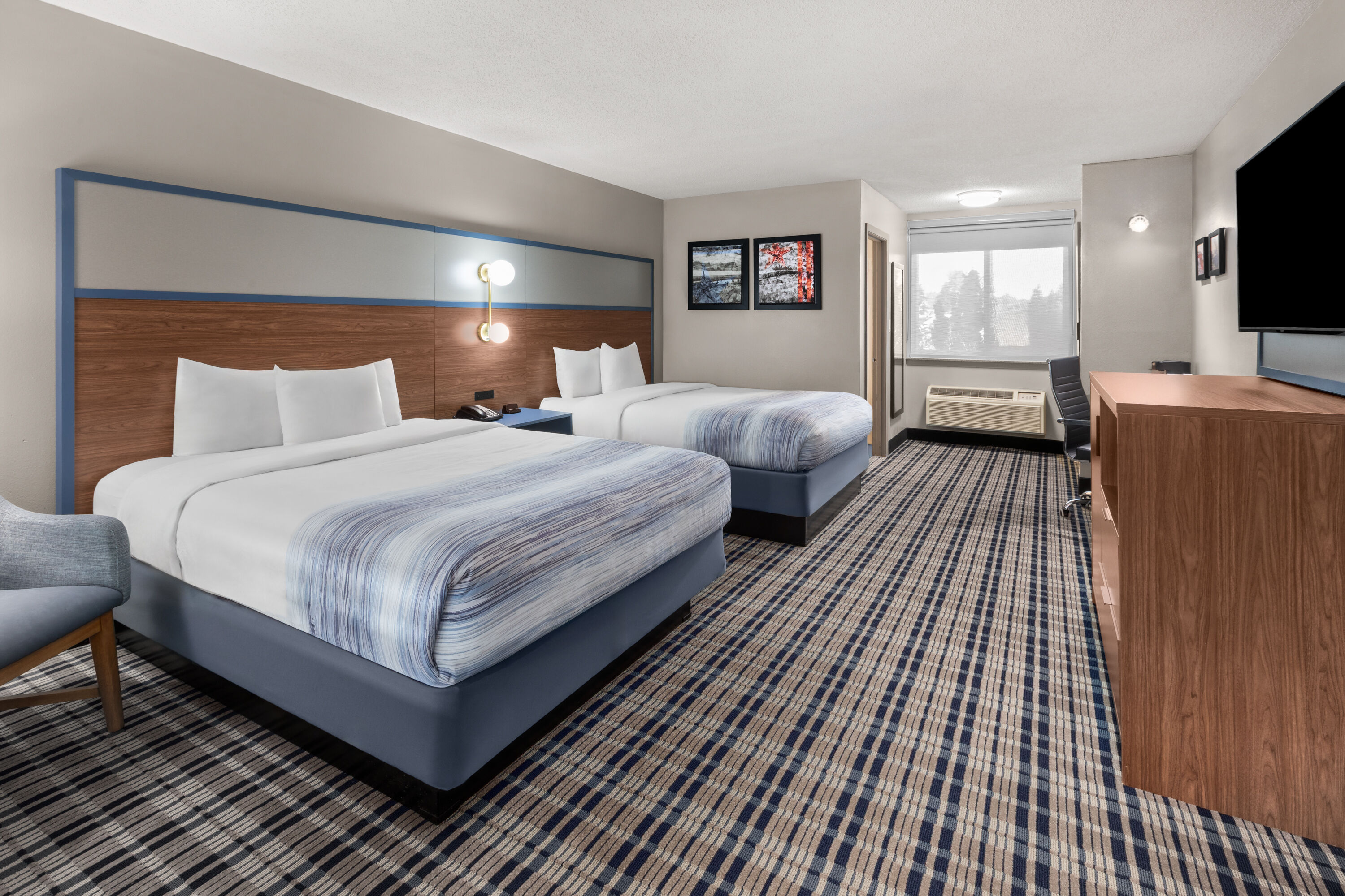 Guest room at the AmericInn by Wyndham Appleton Downtown in Appleton, Wisconsin