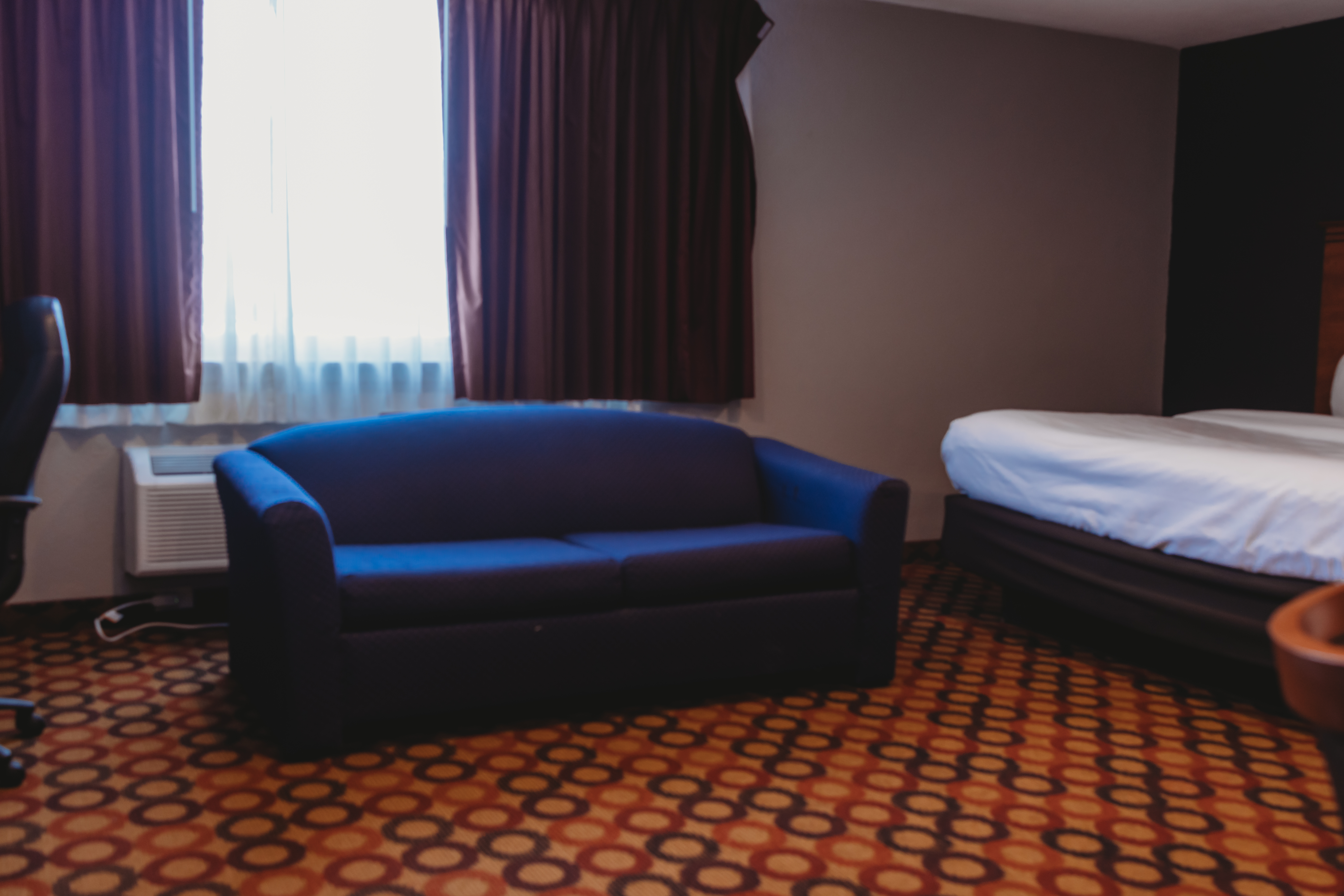 Guest room at the AmericInn by Wyndham Appleton Downtown in Appleton, Wisconsin