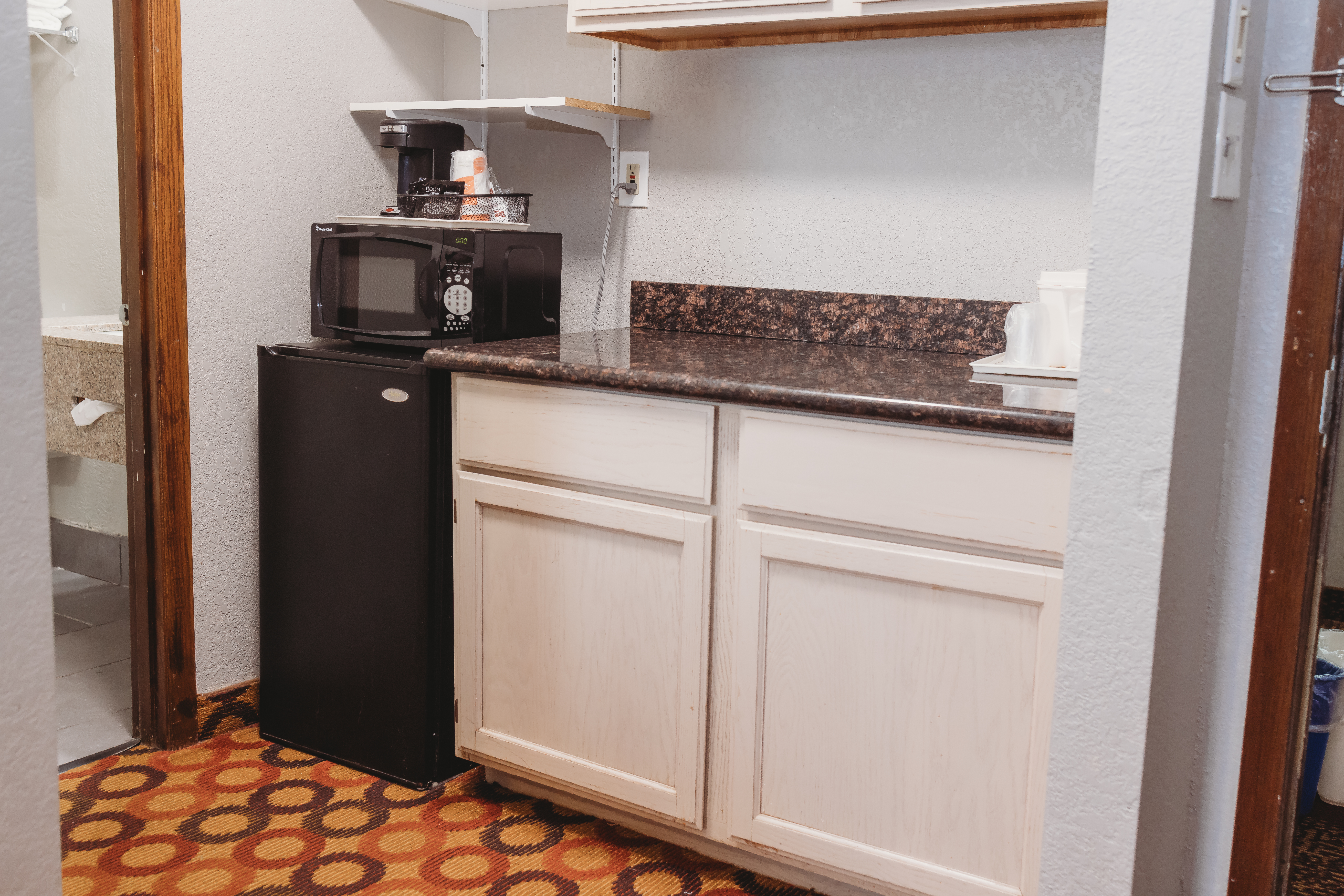 Guest room at the AmericInn by Wyndham Appleton Downtown in Appleton, Wisconsin