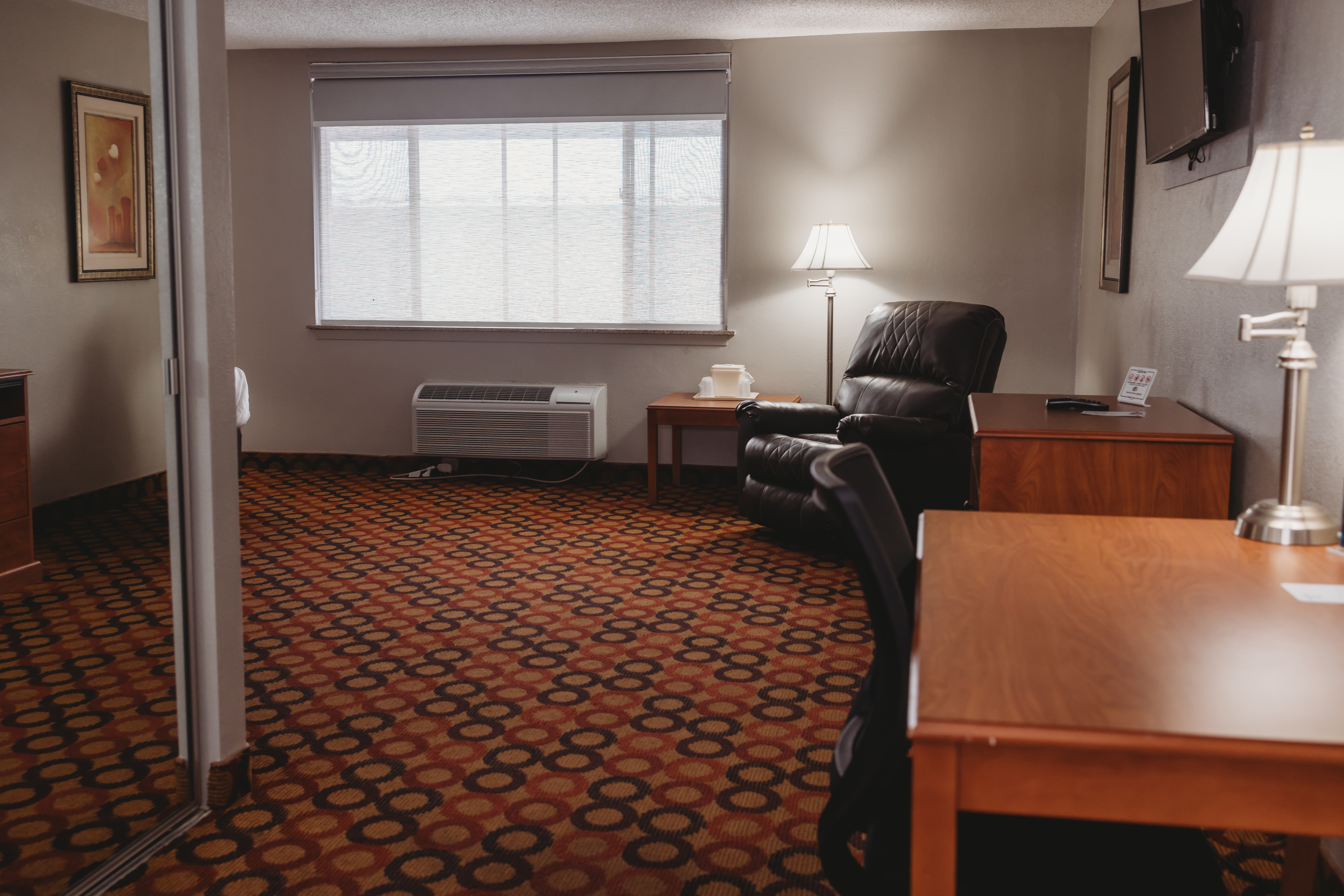 Guest room at the AmericInn by Wyndham Appleton Downtown in Appleton, Wisconsin