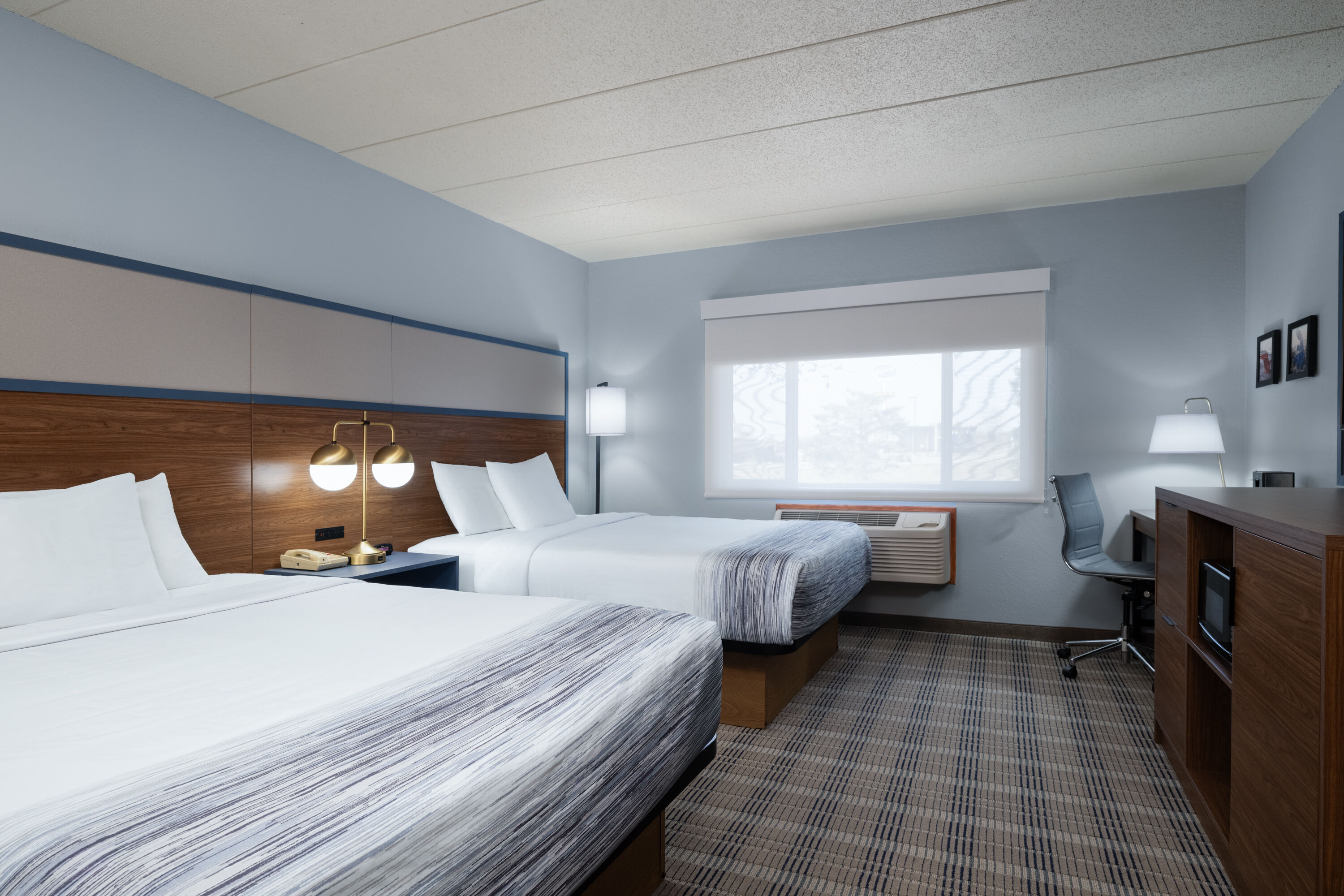 Guest room at the AmericInn by Wyndham Baldwin in Baldwin, Wisconsin